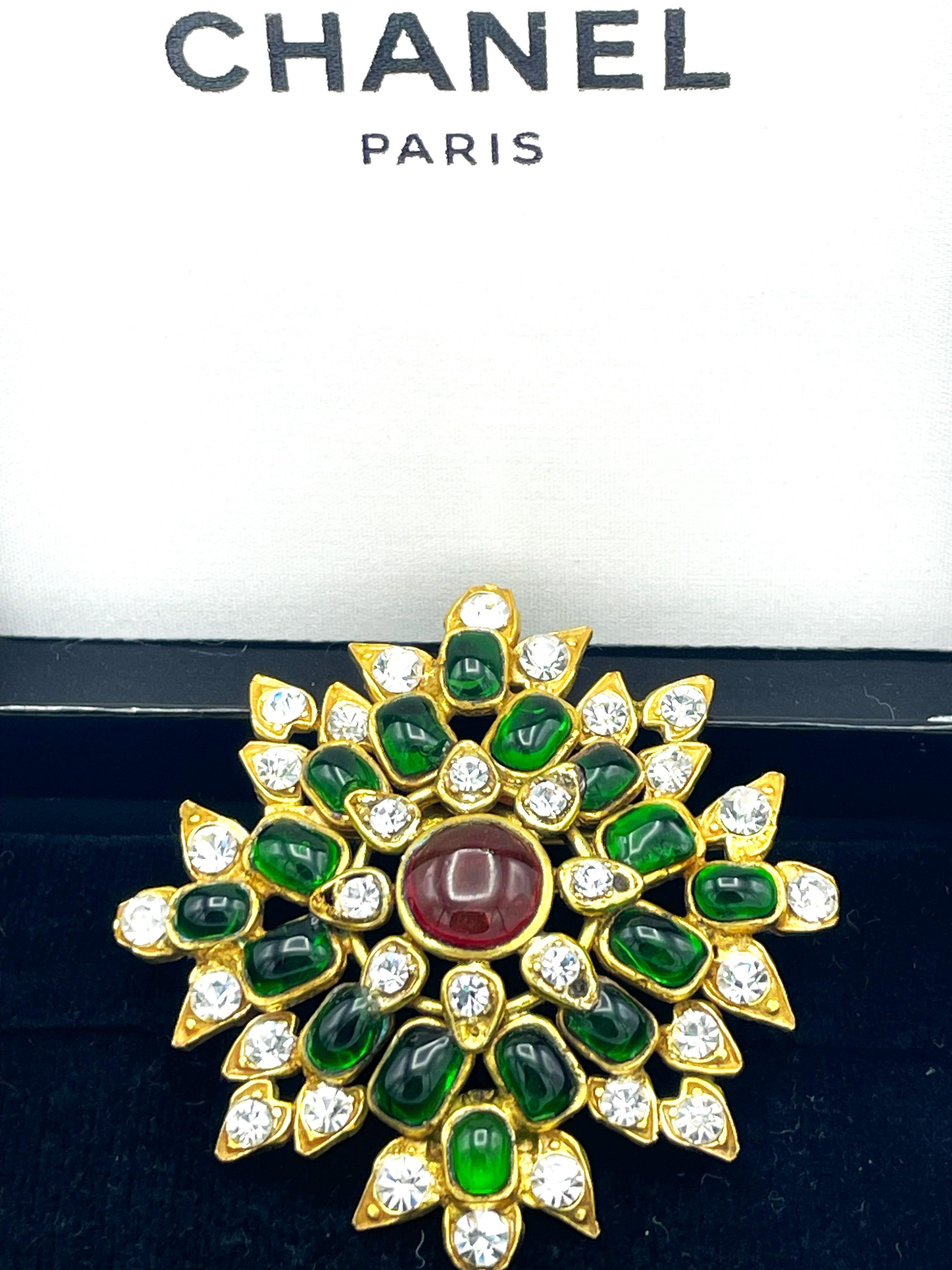 Women's CHANEL BROOCH, green and red Gripoix glass, rhinestons, signed 1970/80, France For Sale
