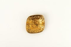 Chanel Brooch in Engraved Gold-Plated Metal