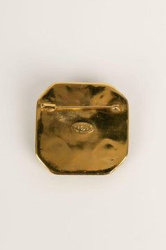 Chanel Brooch in Gilded Metal and Glass Paste
