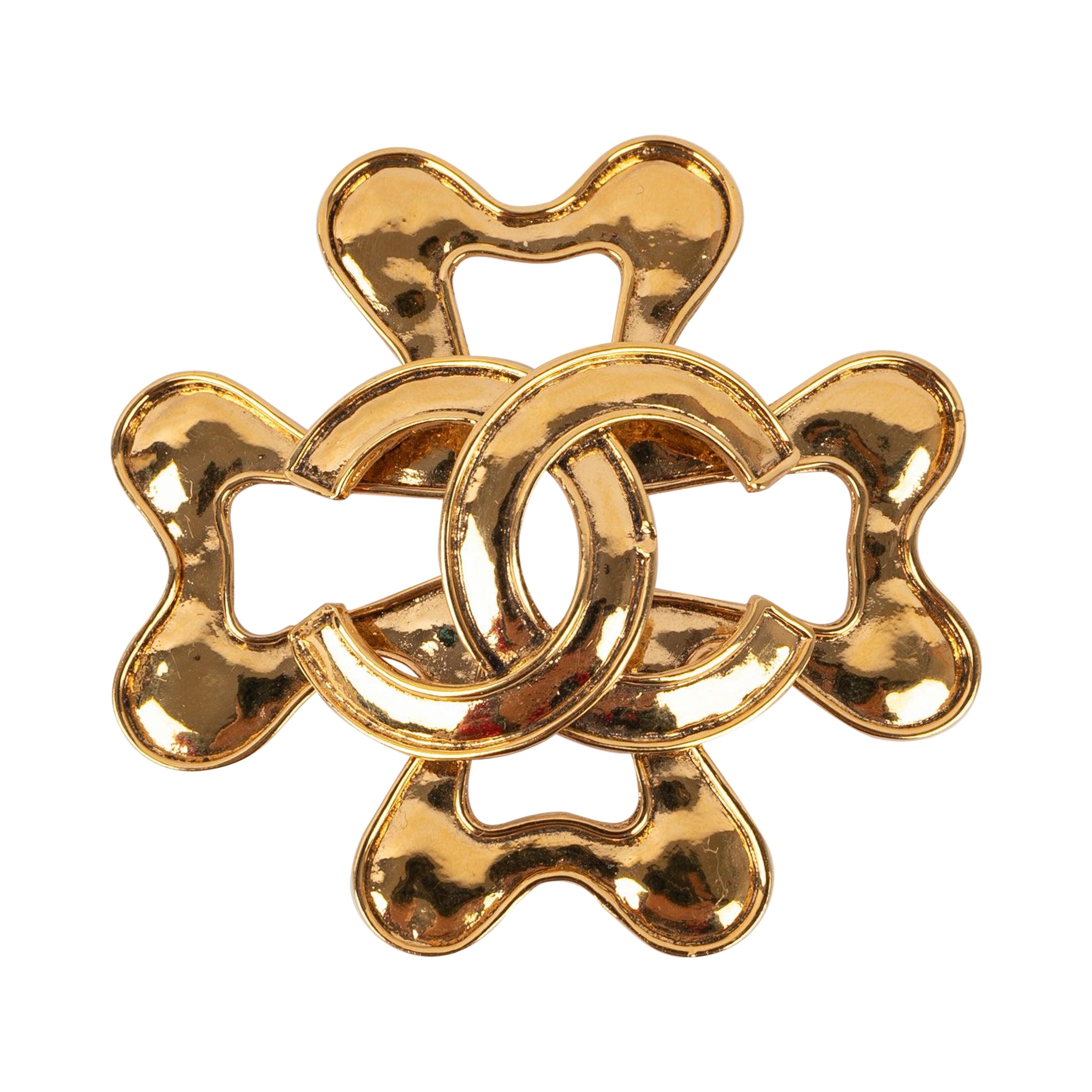 Chanel Brosche aus goldenem Metall mit CC-Logo, 1995