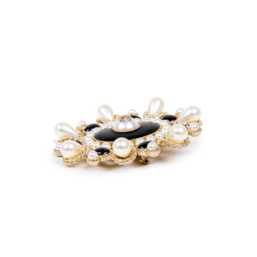 CHANEL Brooch, Paris Cuba Collection in Gilt Metal, Mother of Pearl  1