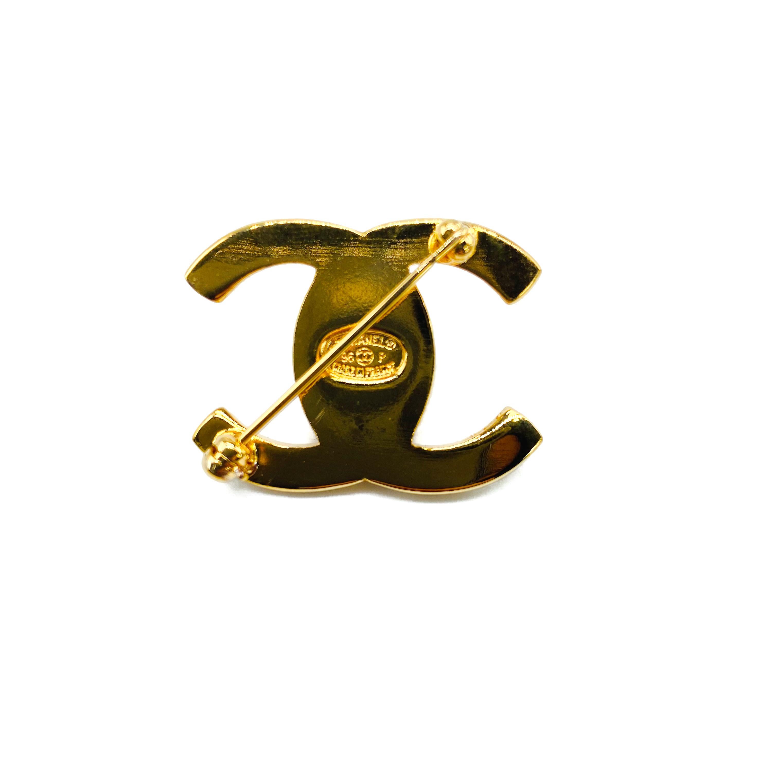 Chanel 1990s Vintage Turnlock Brooch
Iconic piece made for the Autumn Winter 1996 Collection

Detail
-Made in France in 1996 for the Autumn Winter Collection
-Crafted from gold plated metal 
-Iconic turnlock design inspired by the legendary 2.55
