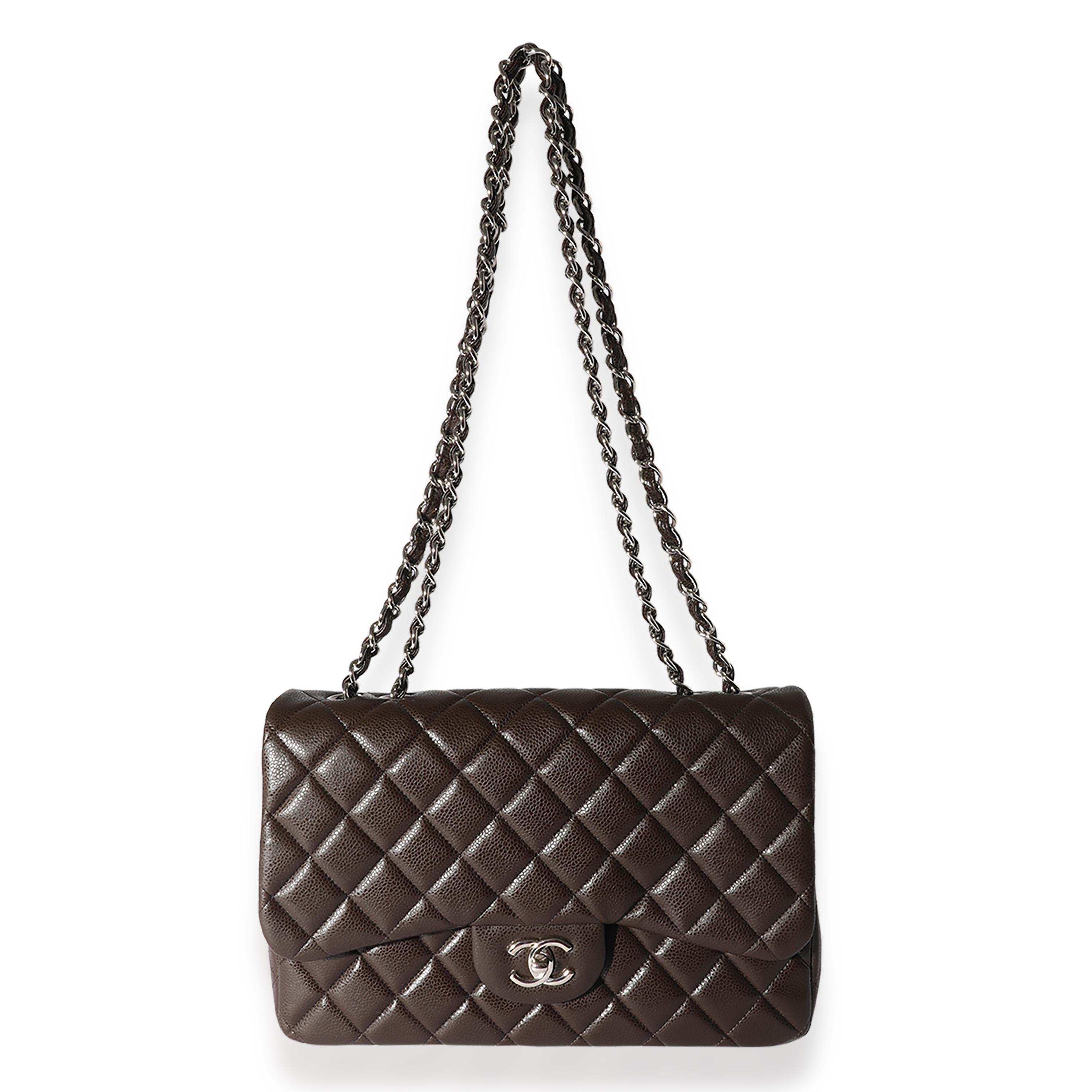 Listing Title: Chanel Brown Caviar Leather Classic Jumbo Singl Flap
SKU: 125782
MSRP: 9500.00
Condition: Pre-owned 
Handbag Condition: Excellent
Condition Comments: Excellent Condition. No visible signs of wear.
Brand: Chanel
Model: Chanel Brown