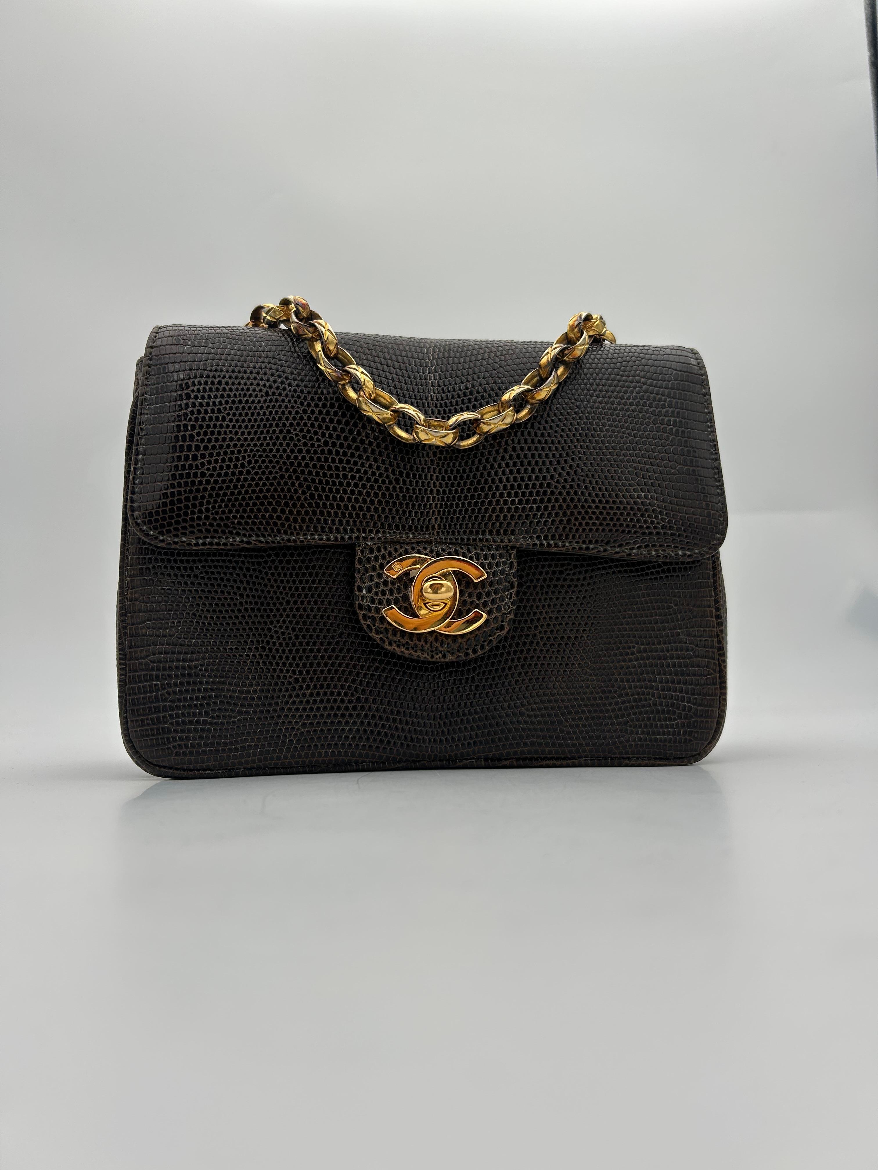 Chanel Brown Classic Lizard Flap Bag 1996. Beautiful chanel bag in lizard and gold toned hardware. Can be worn as a cross body or as a shoulder bag. In 2018 Chanel ceased using exotic skins, making this a rare item that is really sought after by