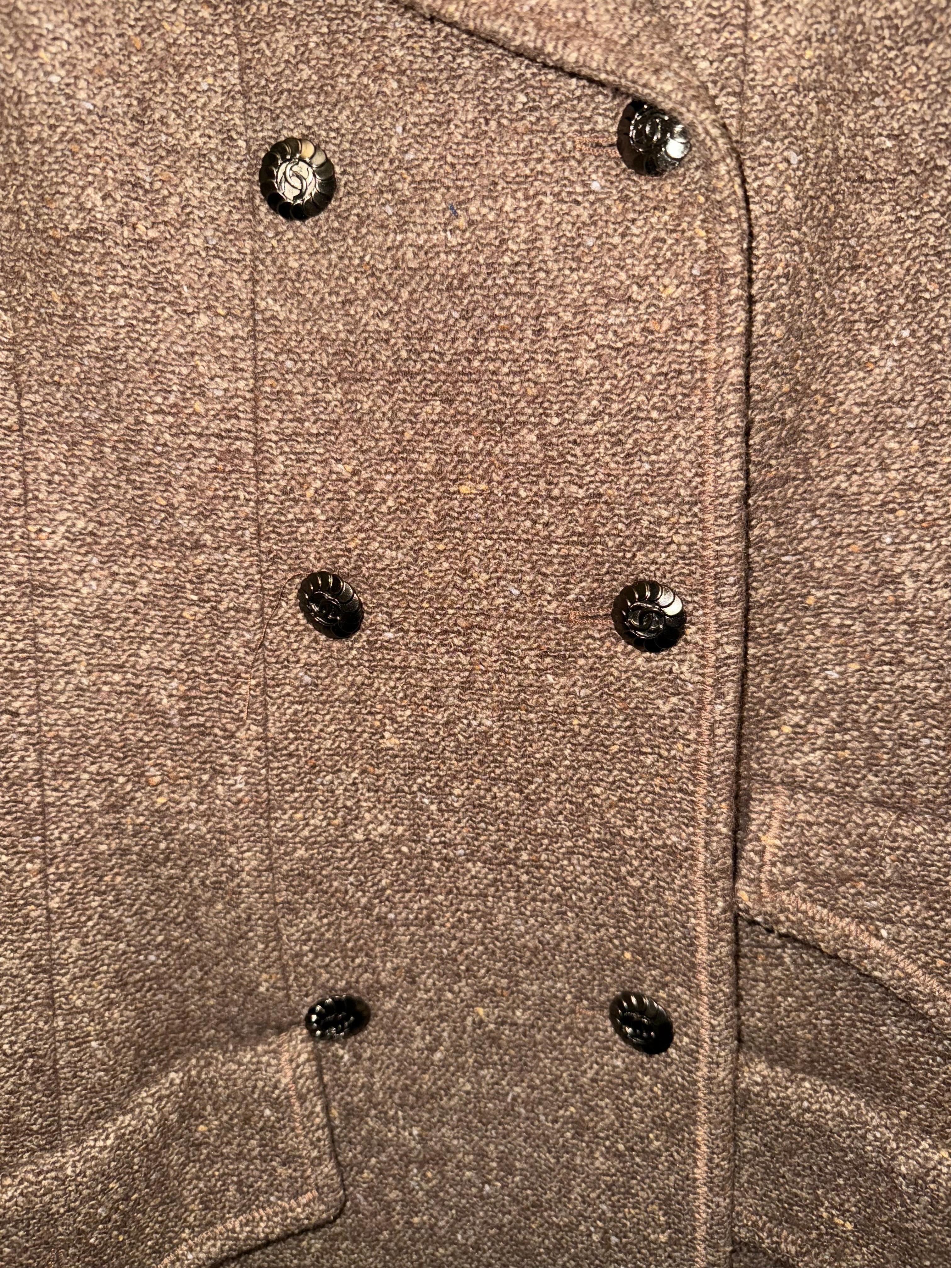 - Classic and timeless Chanel brown double breasted tweed jacket from Fall 1997 collection. 

- CC dark grey toned hardware buttons. 

- Two front pockets with flaps. 

- Double vent. 

- Slim fitted. 

- Measurements: 
Shoulder width: around 16