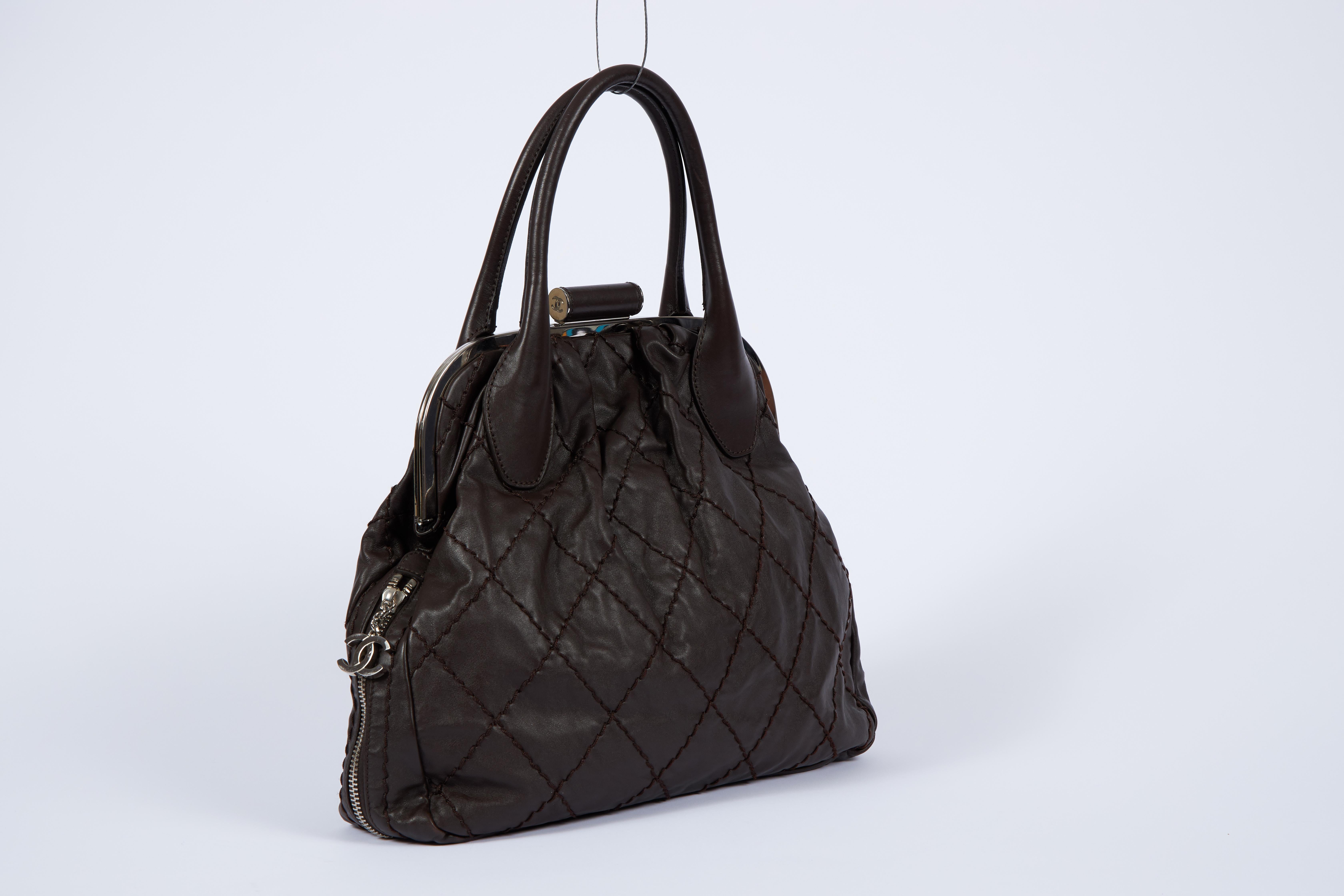 Chanel brown quilted expandable lambskin tote. Handle drop 7