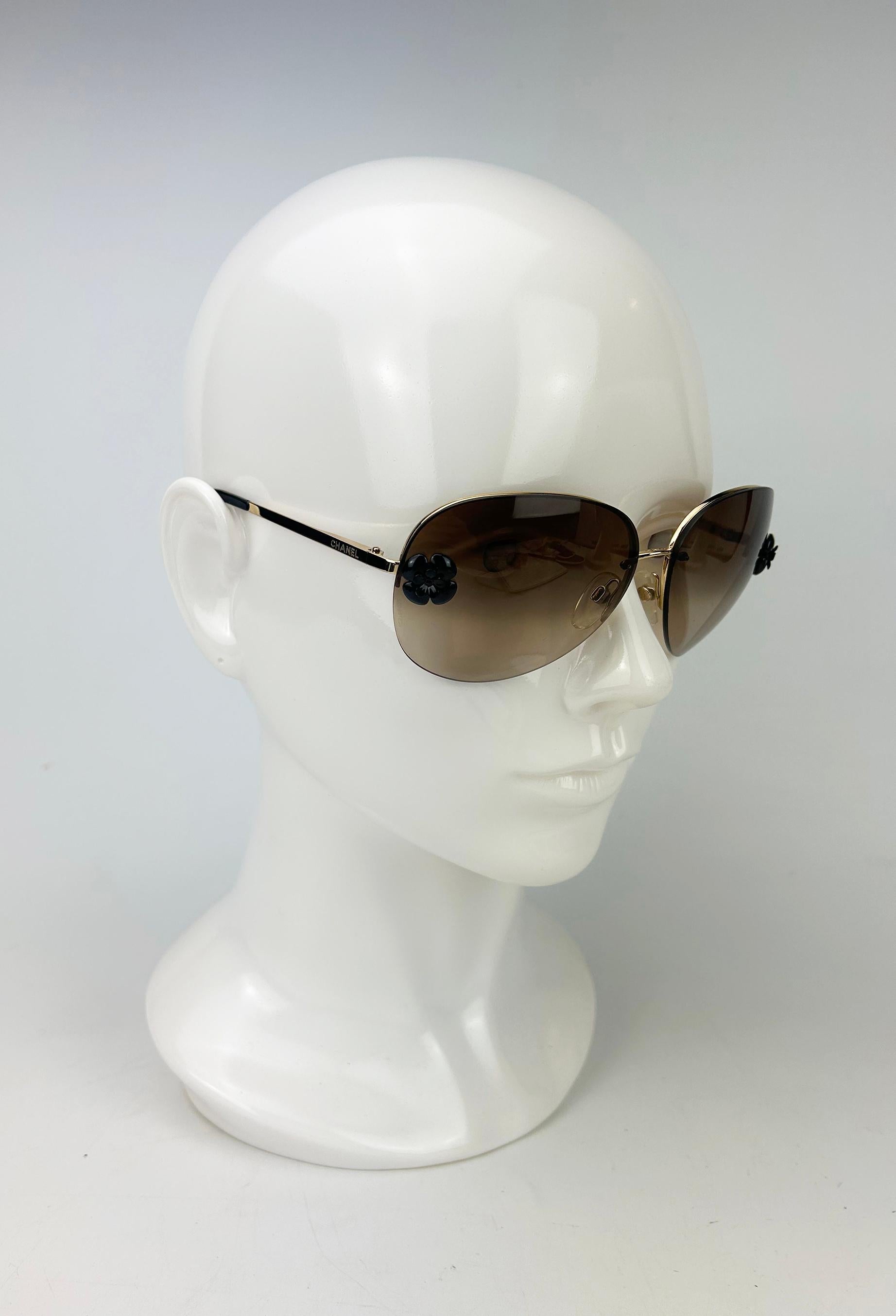 Chanel Brown Frameless Aviator Sunglasses with Black Flower In Good Condition For Sale In Philadelphia, PA