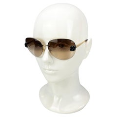 Chanel Gafas de sol de aviador sin montura marrones con flor negra