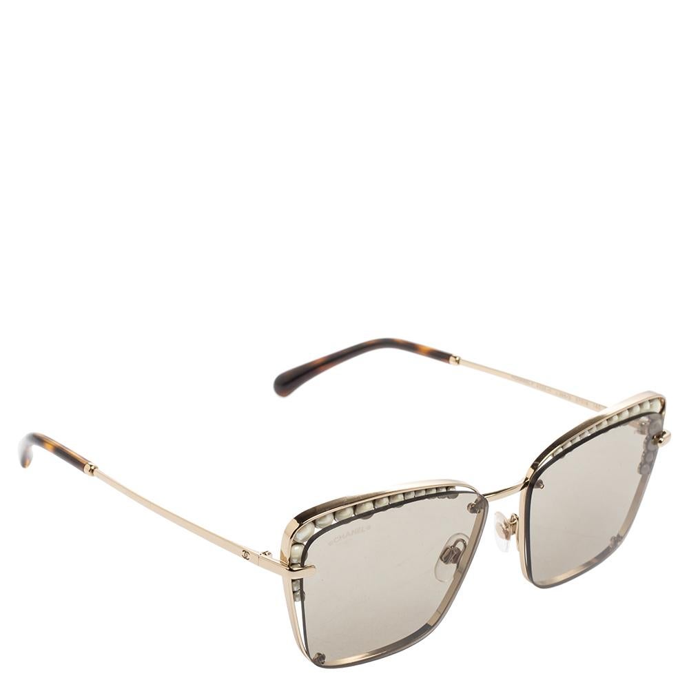The much-coveted cat-eye silhouette is combined with stylish details, to make these Chanel sunglasses one of a kind and super fashionable. The sturdy frame is added with high-quality lenses and pearl accents.

Includes: Original Case
