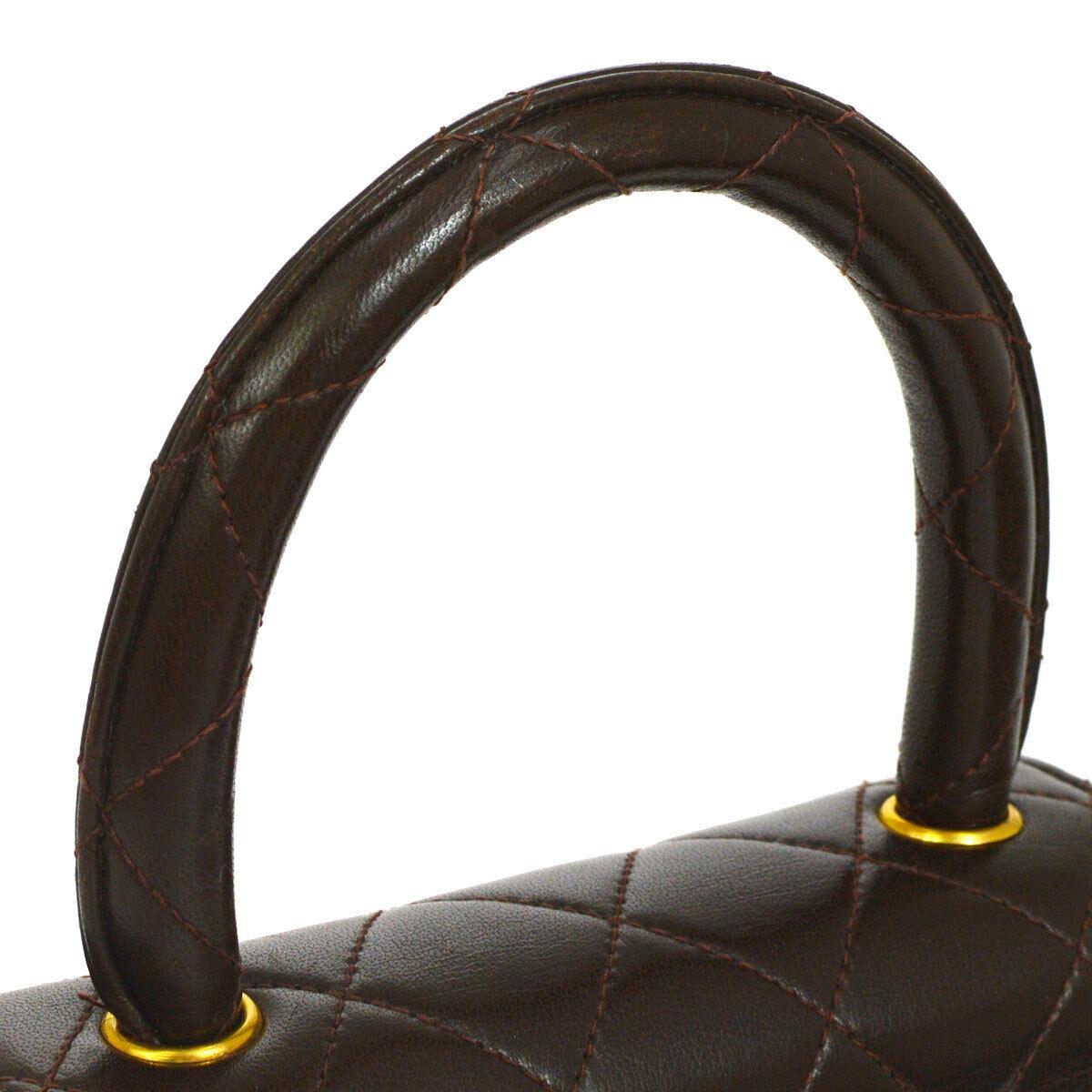 Chanel Brown Leather Mini Small Party Evening Top Handle Satchel Flap Bag

Lambskin
Gold tone hardware
Turn lock closure
Leather lining
Made in France
Handle drop 3