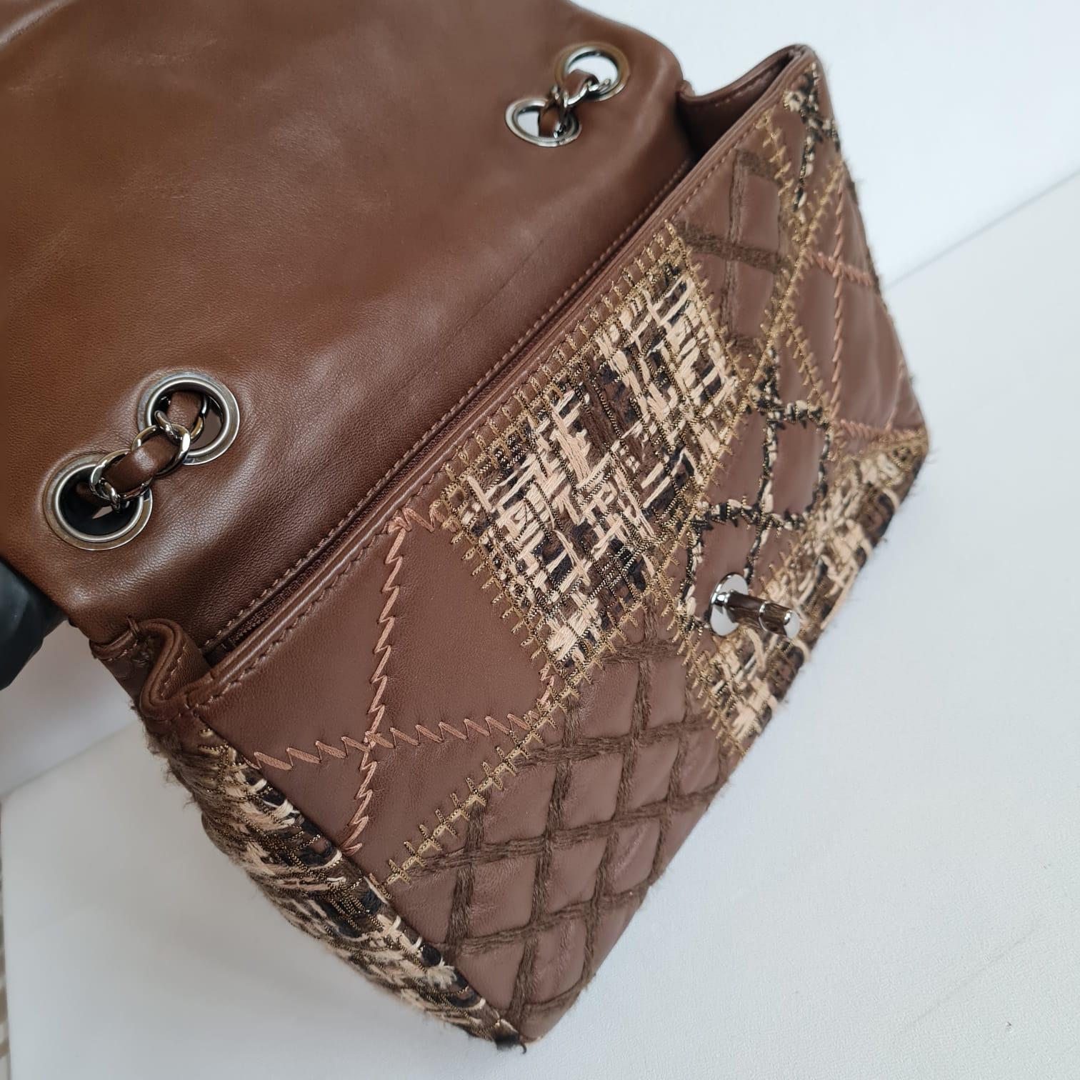 Rare and beautiful brown patchwork flapbag with silver hardware. Overall still in excellent condition. Item is series #15. Comes with its card and dust bag. 