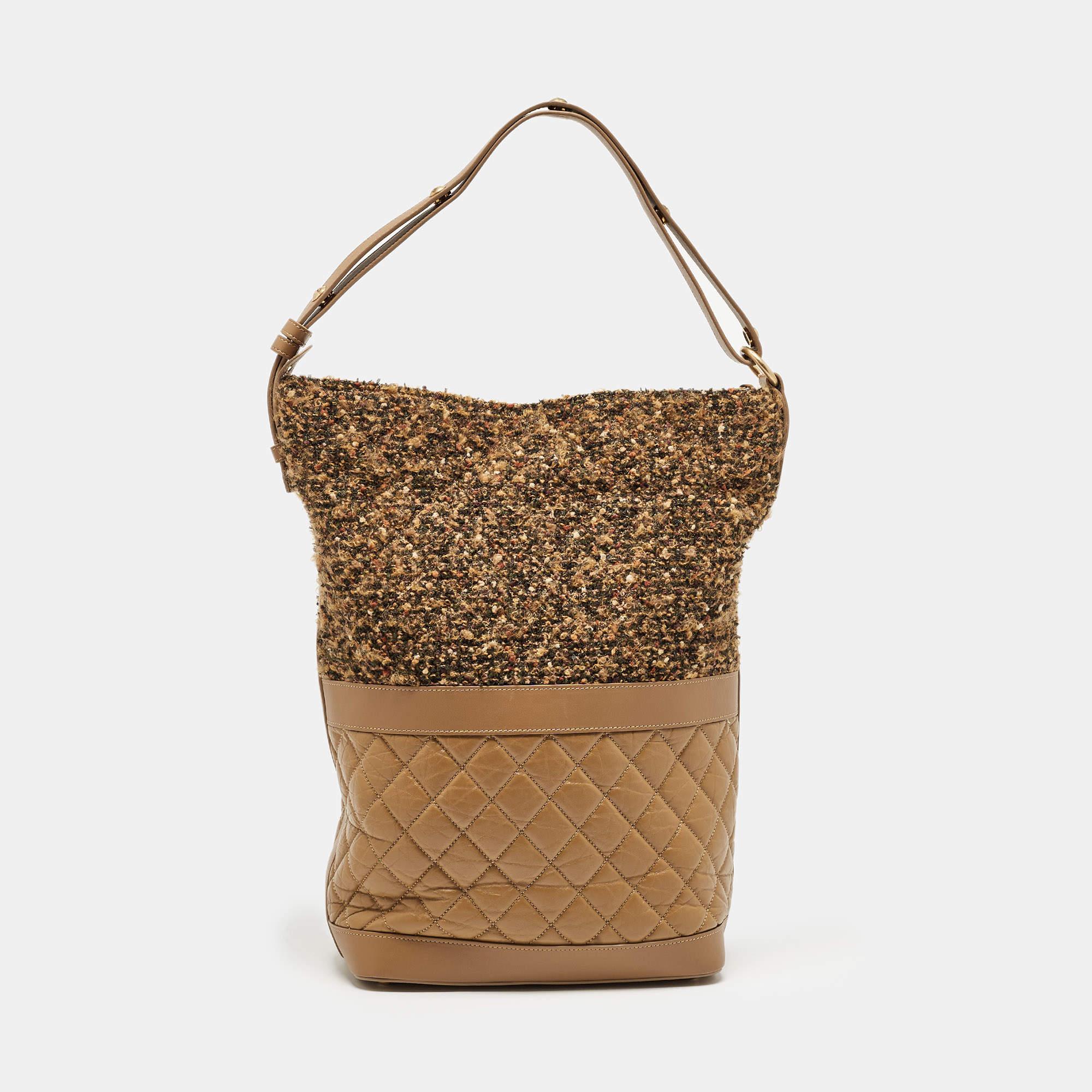 Thoughtful details, high quality, and everyday convenience mark this designer hobo for women by Chanel. The bag is sewn with skill to deliver a refined look and an impeccable finish.

Includes: Original Dustbag, Authenticity Card