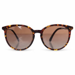 Chanel, Brown round tortoise sunglasses with pearl