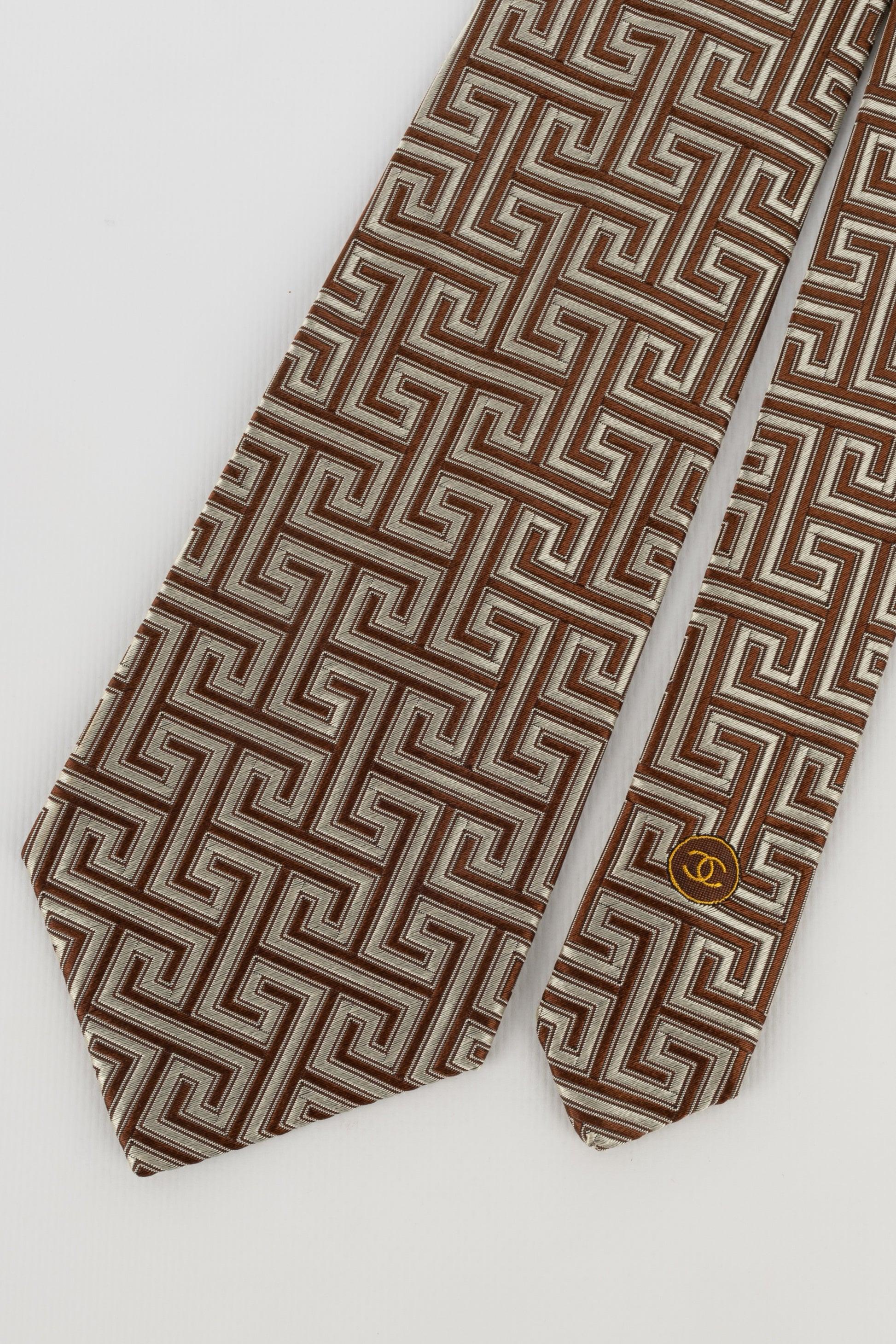 Chanel - (Made in Italy) Brown-tone silk tie.

Additional information:
Condition: Very good condition
Dimensions: Length: 140 cm

Seller Reference: ACC148