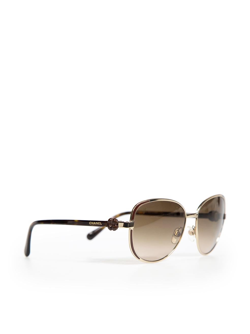 CONDITION is Good. Minor wear to the sunglasses is evident, there are minor scratches on the lens of this used Chanel designer resale item. This item comes with the original box.
 
 
 
 Details
 
 
 Brown
 
 Acetate
 
 Round sunglasses
 
