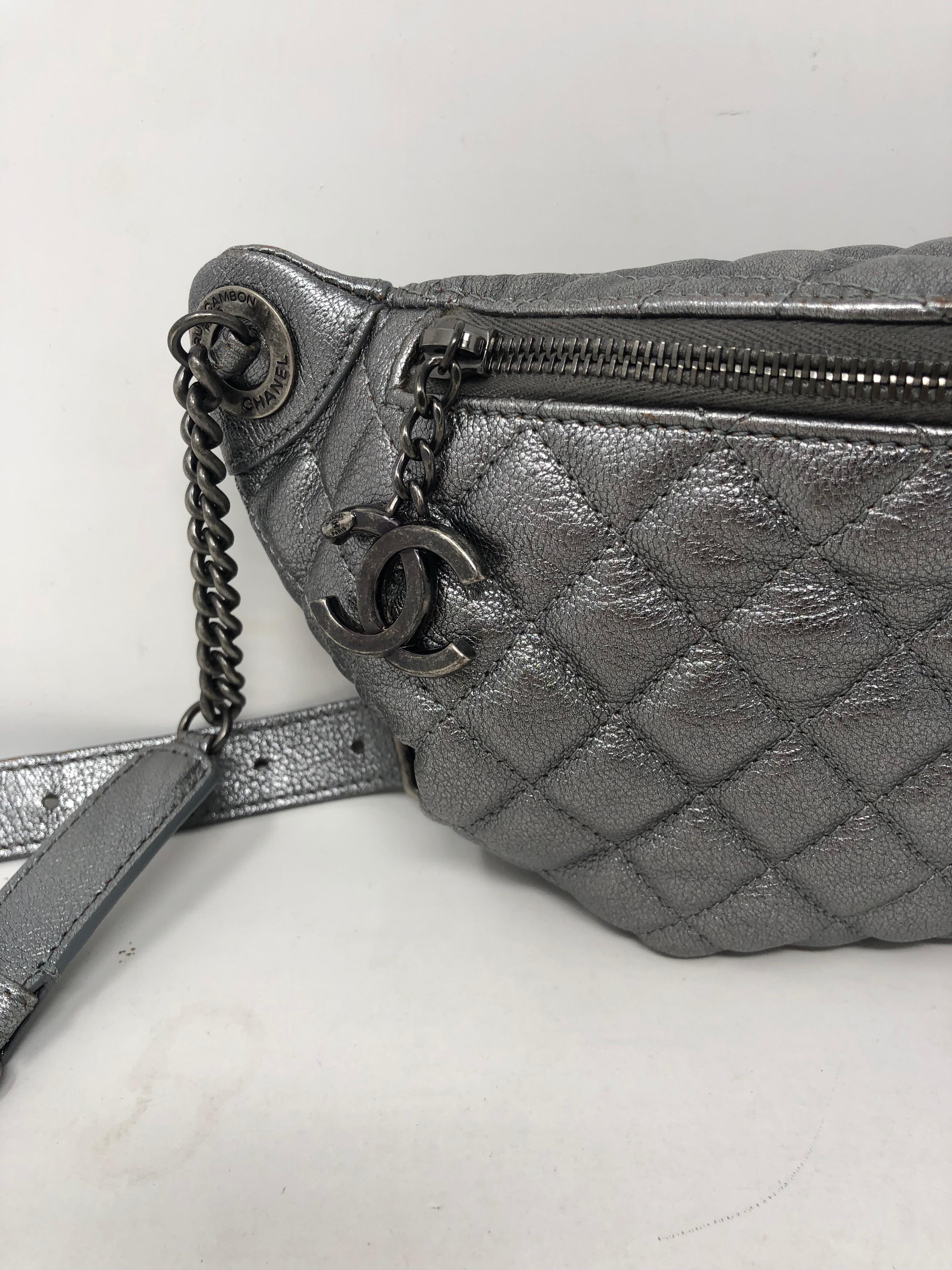 Chanel Bum Bag Silver Metallic Leather. Rare and limited belt/ bag fanny pack. Very stylish look and can hold a cell phone and more. Light wear in good condition. Guaranteed authentic. 