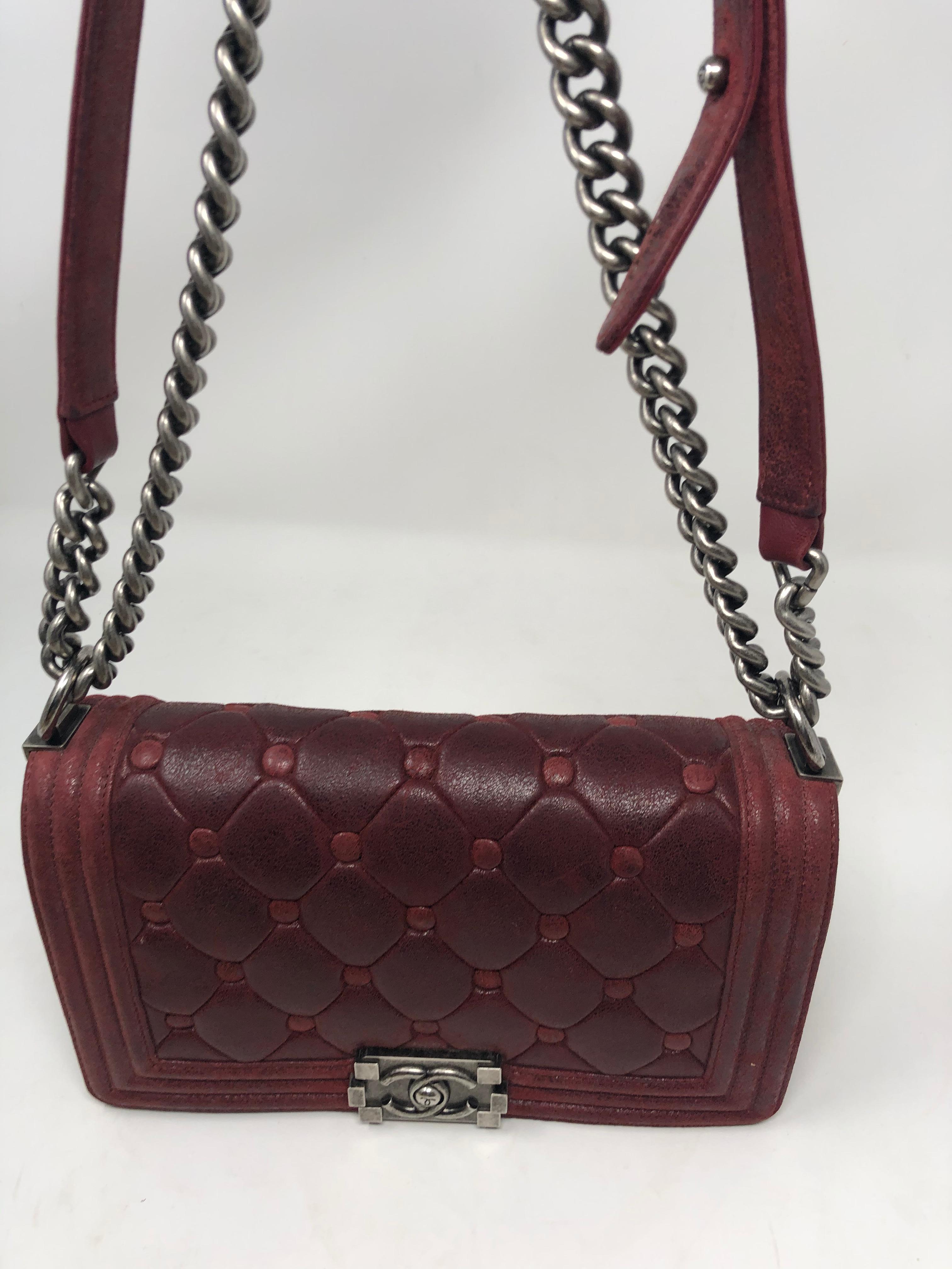 Chanel Burgundy Leather Limited Boy Bag. Unique design and rich burgundy color. Silver hardware. Good condition. Guaranteed authentic. 