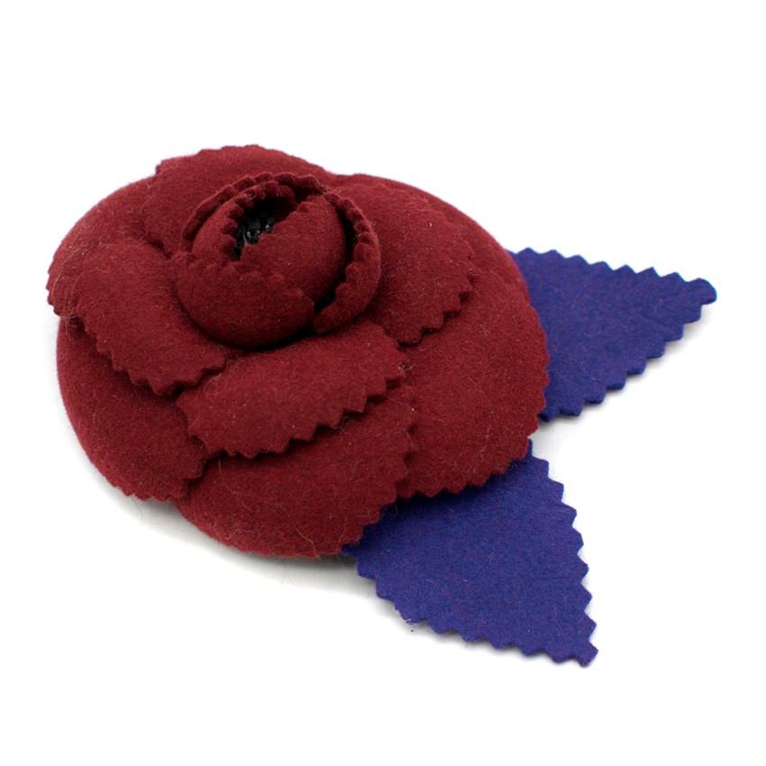 Chanel Burgundy Camellia Brooch

-Burgundy camellia brooch
-Purple felt leaves
-Safety pin style closure
-Features gold toned Chanel plate

Please note, these items are pre-owned and may show signs of being stored even when unworn and unused. This