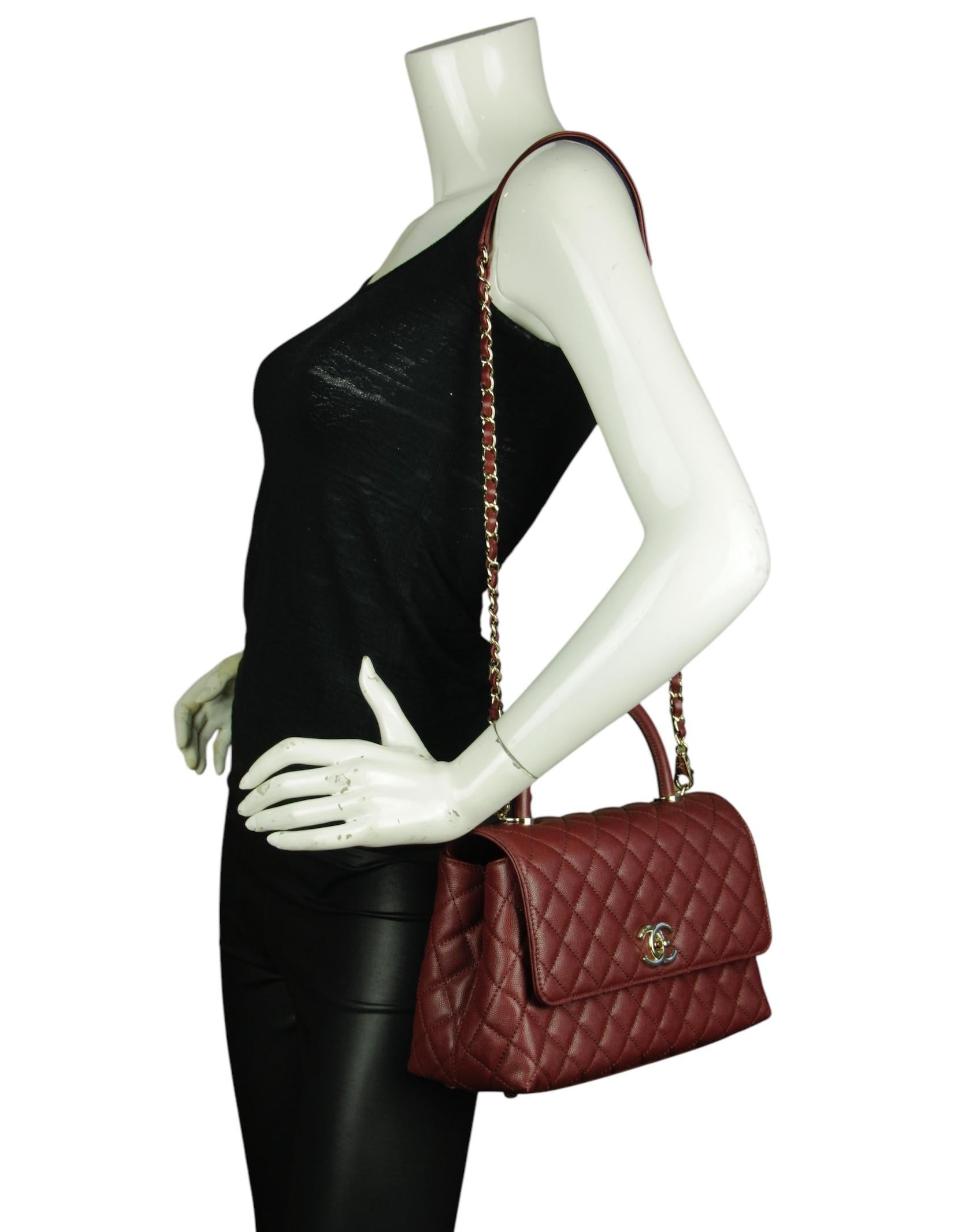 Chanel Burgundy Caviar Leather Quilted Small Coco Handle Flap Bag

Made In: Italy
Year of Production: 2024
Color: Burgundy
Hardware: Pale goldtone
Materials: Caviar leather
Lining: Leather
Closure/Opening: Flap top with CC twist lock
Exterior