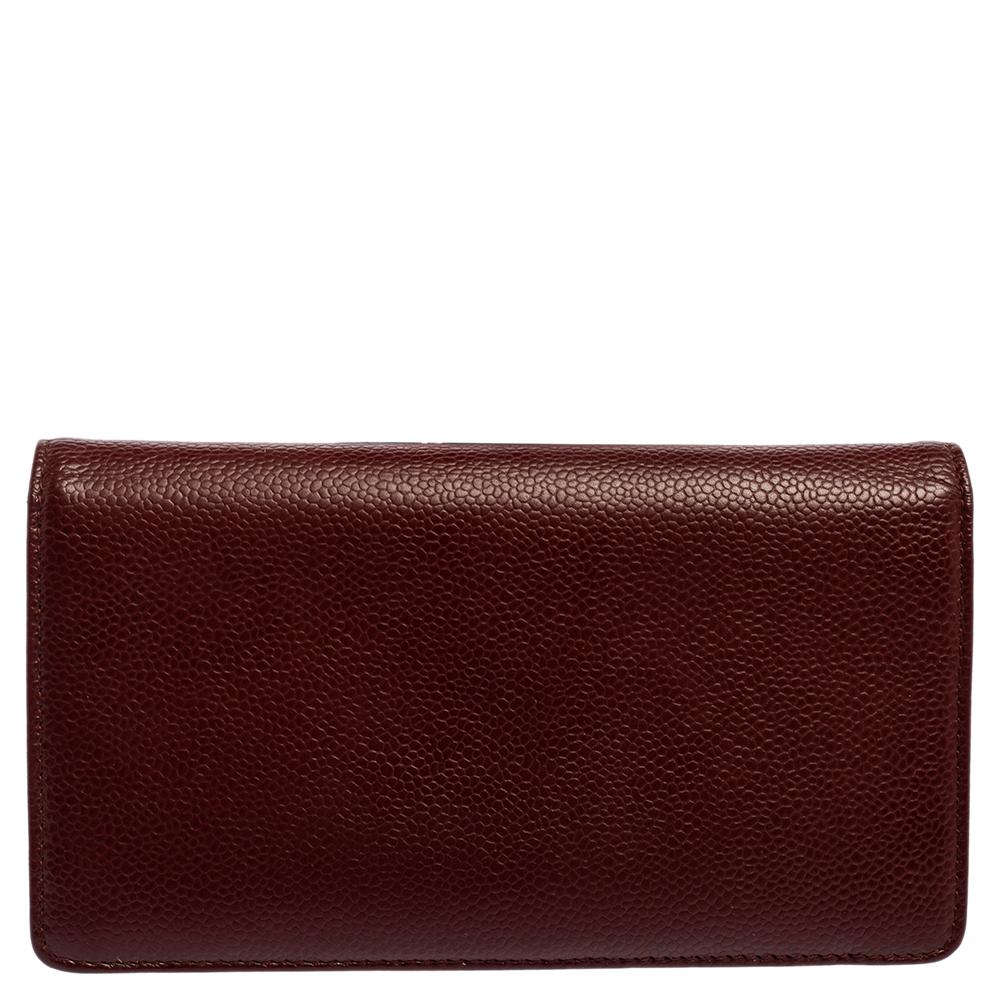 A classic wallet like this one from Chanel will make a great companion for every day. It features a burgundy Caviar leather body and features a bi-fold silhouette. This wallet comes equipped with several card slots and pockets to secure your cards