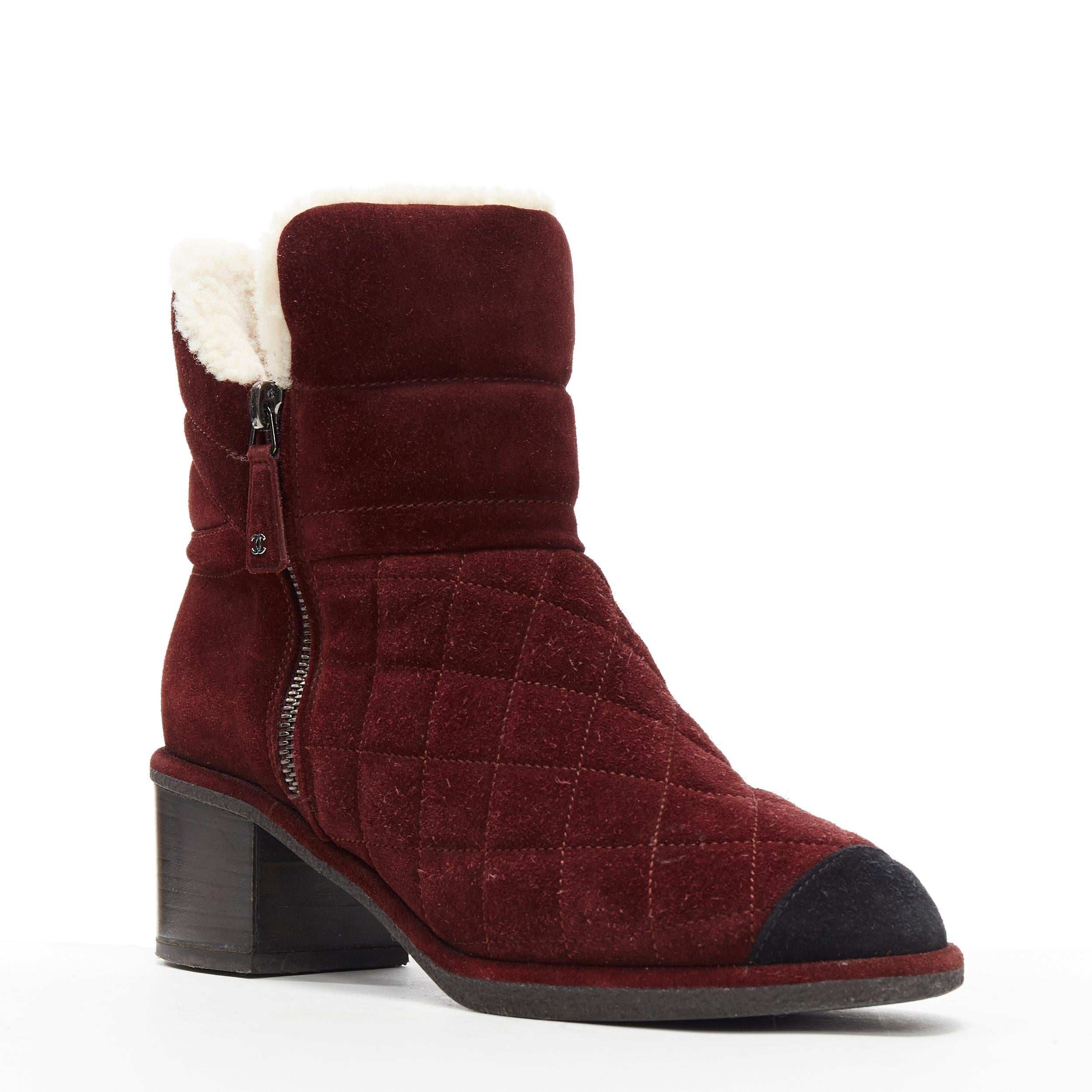 CHANEL burgundy CC red diamond quilted suede toe cap shearling ankle boot EU37
Brand: Chanel
Designer: Karl Lagerfeld
Model Name / Style: Shearling boot
Material: Suede
Color: Burgundy
Pattern: Solid
Closure: Zip
Extra Detail: Mid (2-2.9 in) heel