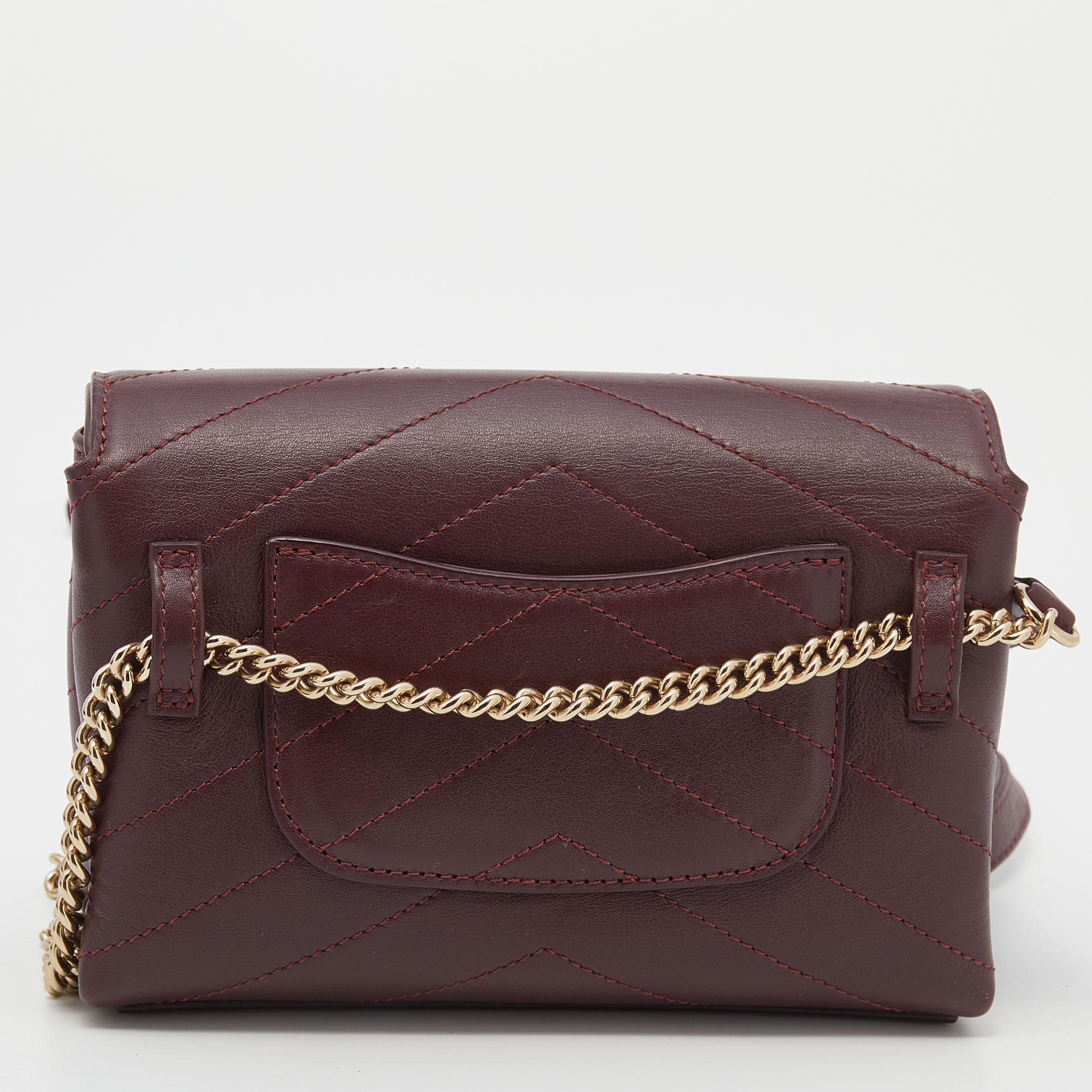 This waist bag from Chanel is your perfect travel companion for those relaxed vacations. It is crafted from burgundy chevron leather and comes with gold-tone details. Truly a worthy investment!

Includes: Original Box