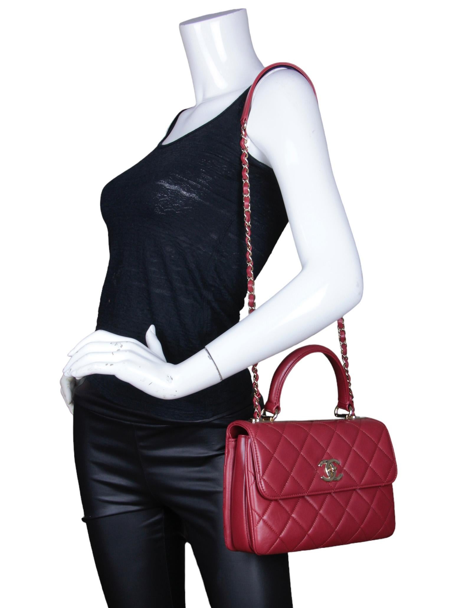 Chanel Burgundy Lambskin Quilted Trendy CC Dual Handle Flap Bag

Made In: Italy
Year of Production: 2017
Color: Burgundy 
Hardware: Goldtone
Materials: Lambskin
Lining: Burgundy leather 
Closure/Opening: Flap top with CC twistlock
Exterior Pockets: