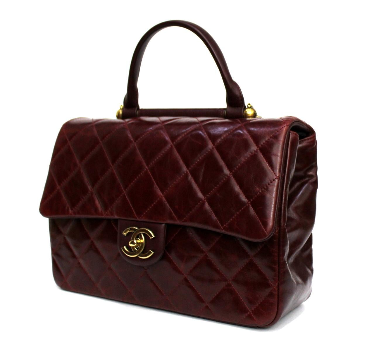 From the 2016 collection there was this beautiful bag in burgundy leather and gold aged hardware. The bag features the iconic quilting with a single top handle and a chunky chain shoulder strap. It can be carried in a variety of ways, by hand, on