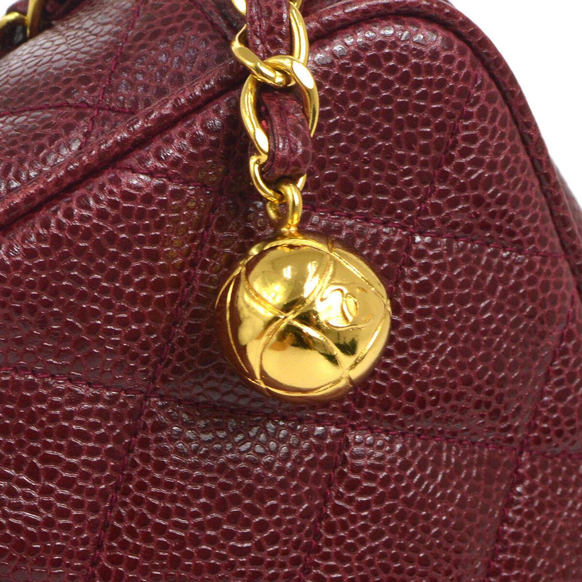 Chanel Burgundy Lizard Exotic Leather Small Evening Gold Camera Shoulder Bag in Box

Lizard
Gold tone hardware
Zipper closure
Leather lining
Date code present
Shoulder strap drop 19.5