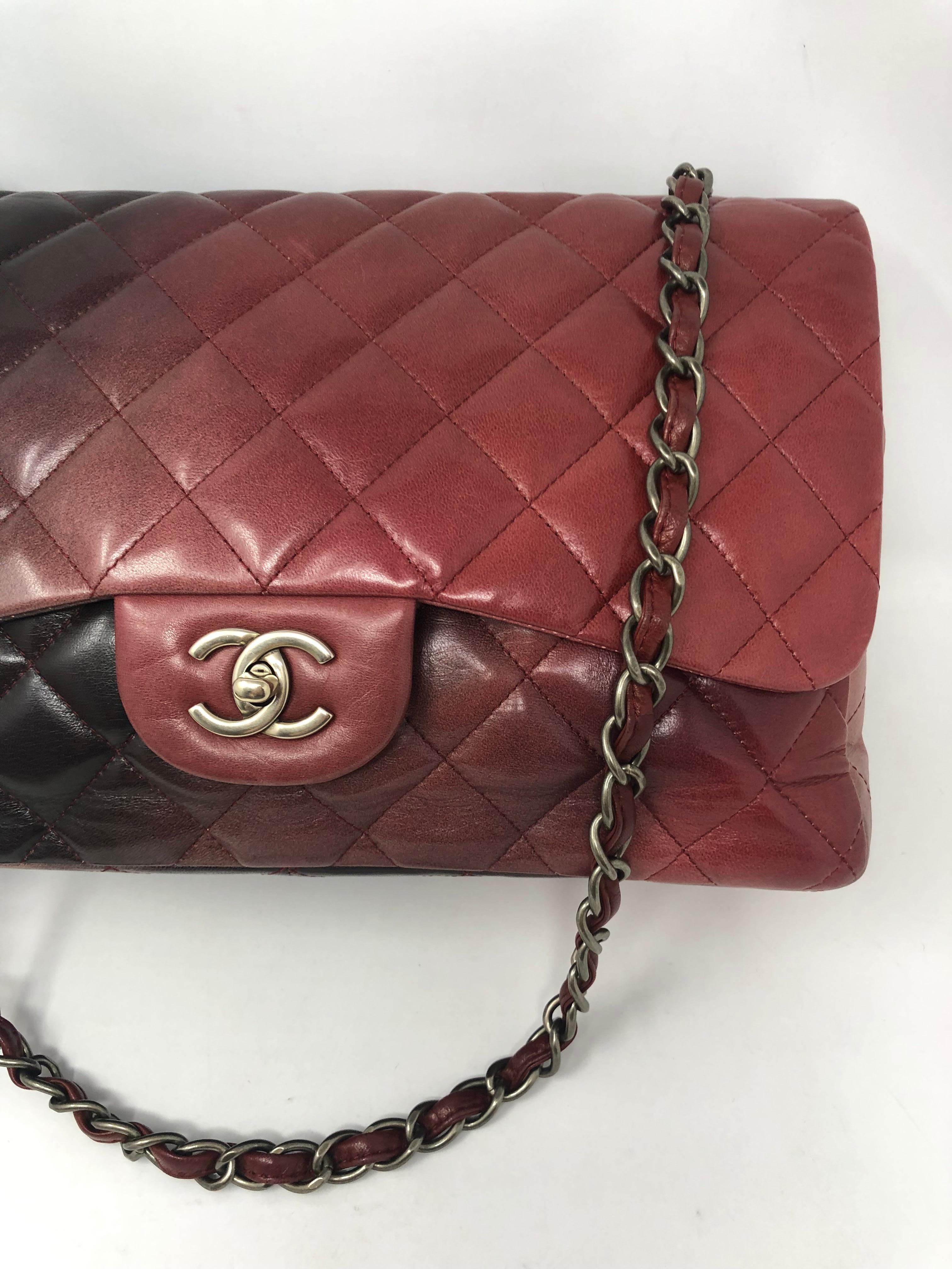 Chanel Burgundy Ombre Jumbo Bag. Classic style with black to red ombre shades. Matte gold hardware. Mint condition. Rare and limited Chanel. Guaranteed authentic. 