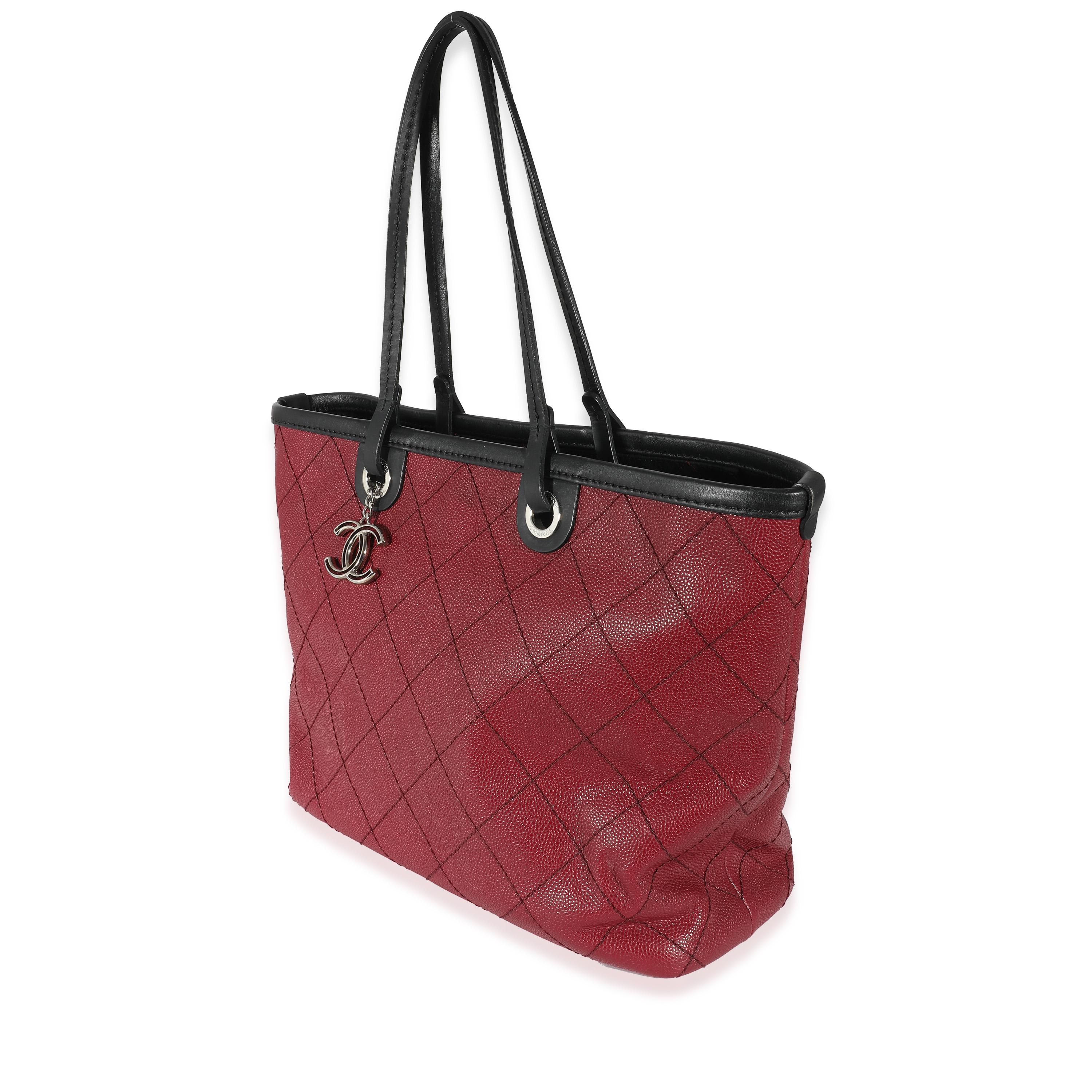 Listing Title: Chanel Burgundy Quilted Caviar Fever Tote
SKU: 135423
Condition: Pre-owned 
Handbag Condition: Very Good
Condition Comments: Item is in very good condition with minor signs of wear. Exterior scuffing along corners and throughout.