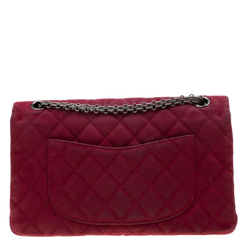Modern women need their hands free, therefore this design was created with a stylish shoulder chain to flaunt the Reissue 2.55 classic bag anywhere. The Chanel piece is crafted from burgundy caviar nubuck and features signature quilted pattern. The