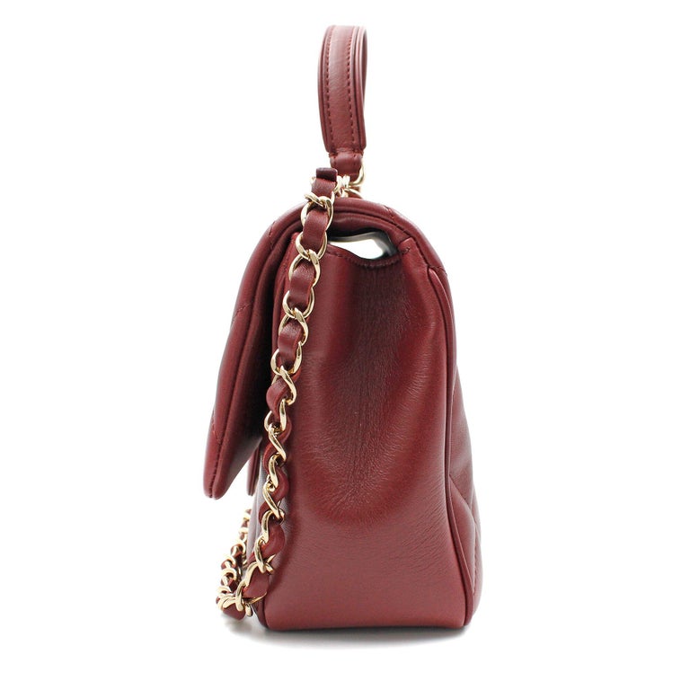 Flap bag with top handle, Lambskin & gold-tone metal, burgundy — Fashion