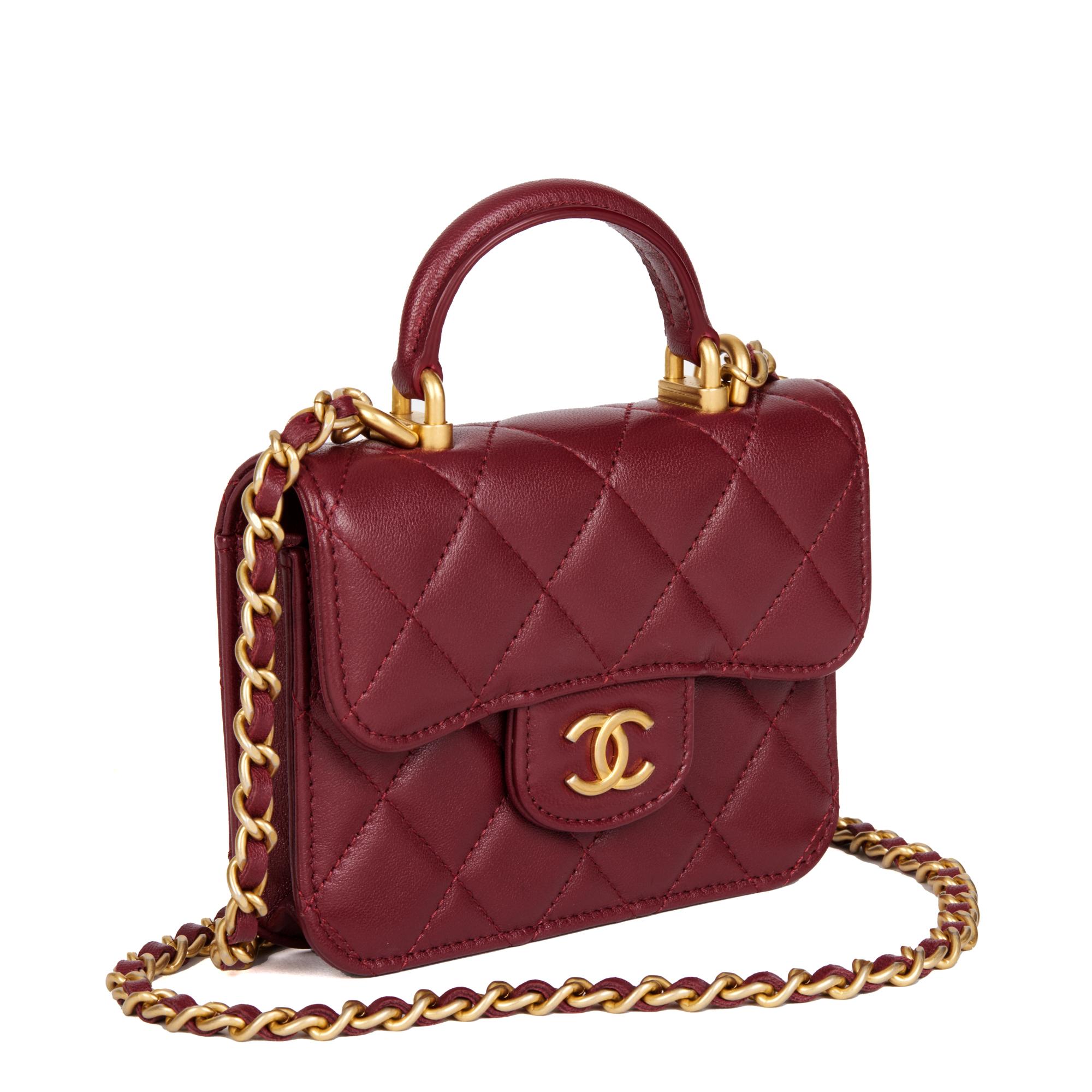 CHANEL
Burgundy Quilted Lambskin Leather Top Handle Mini Card Holder

Xupes Reference: CB588
Serial Number: 31421361
Age (Circa): 2021
Accompanied By: Chanel Dust Bag, Authenticity Card
Authenticity Details: Authenticity Card, Serial Sticker (Made