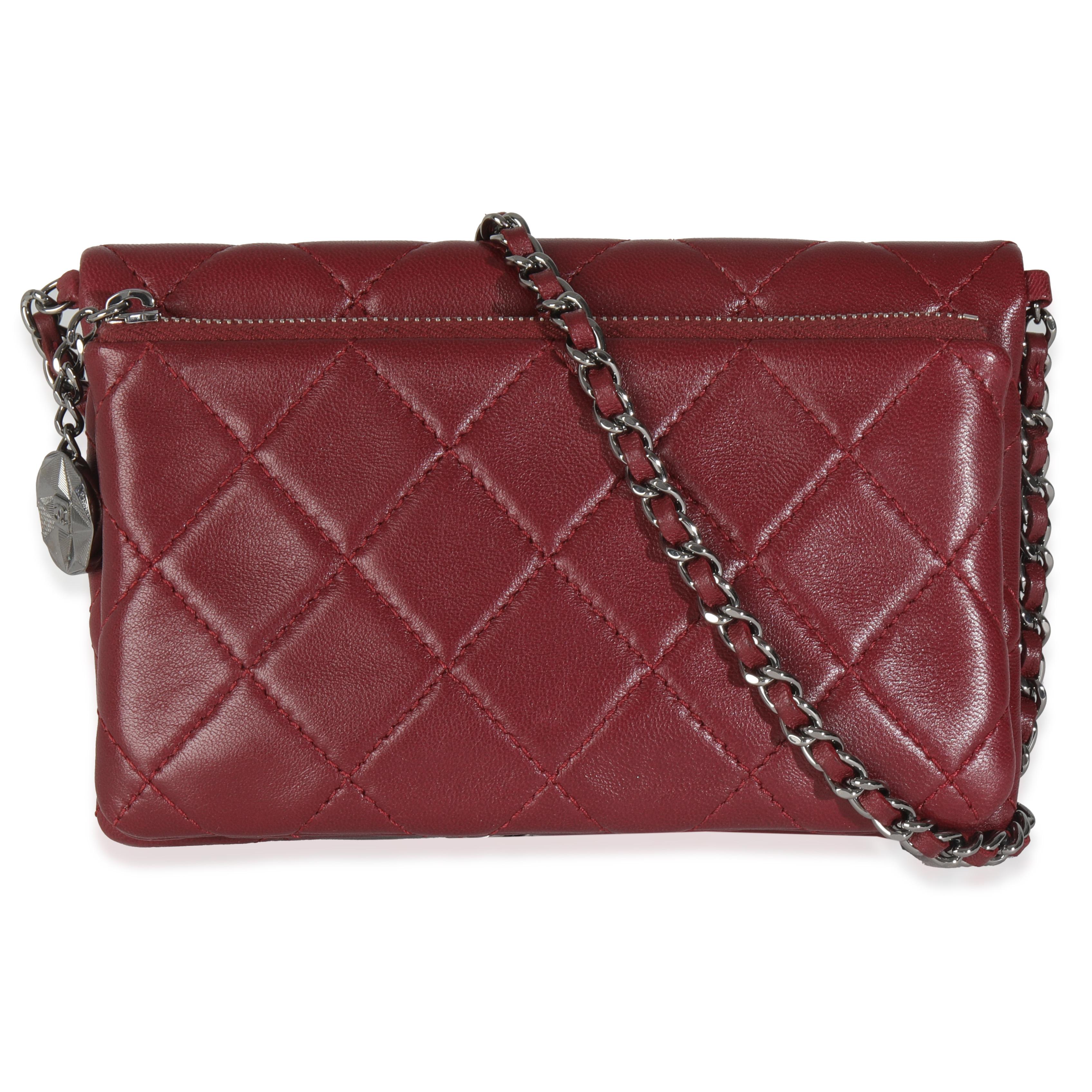 Listing Title: Chanel Burgundy Quilted Lambskin Mineral Nights Clutch On Chain
SKU: 145014
Condition: Pre-owned 
Handbag Condition: Excellent
Condition Comments: Item is in excellent condition and displays light signs of wear. Minor wear along