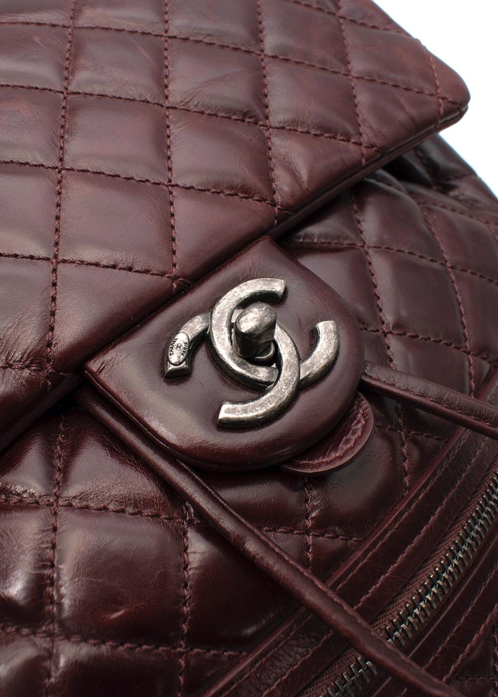 Chanel Burgundy Quilted Leather Urban Spirit Backpack

- Fall 2015 collection 
- Signature diamond-quilted exterior
- Shiny calfskin leather 
- Front zip pocket and dangling CC zipper closure
- Flap top with the classic CC turn-lock and a cinch