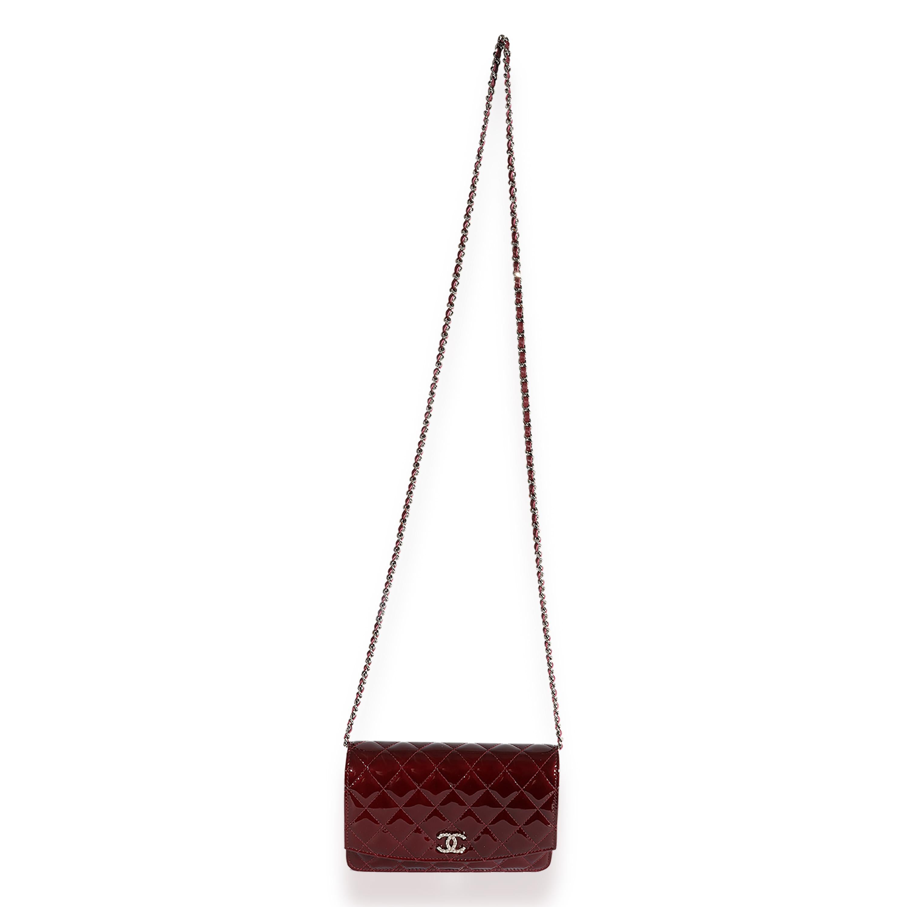 Listing Title: Chanel Burgundy Quilted Patent Leather Brilliant Wallet On Chain
SKU: 124002
Condition: Pre-owned 
Handbag Condition: Very Good
Condition Comments: Very Good Condition. Light smudging and marks to patent leather. Scuffing to interior