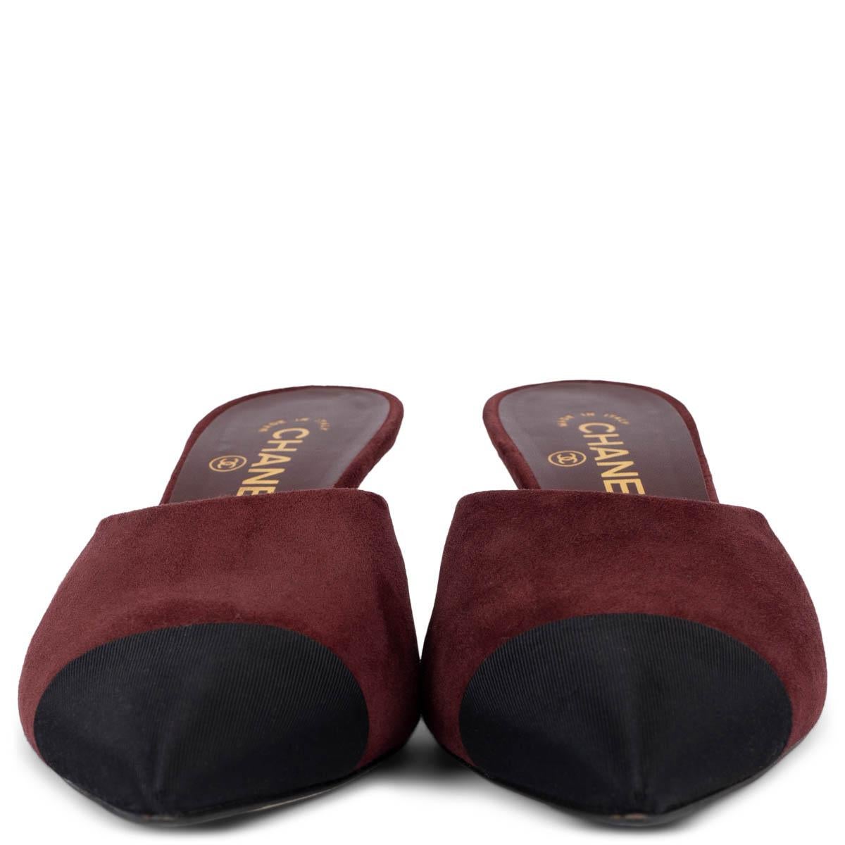 100% authentic Chanel mules in burgundy suede with classic black grosgrain tip. Have been worn and are in excellent condition. 

2016 Paris-Rome Metiers d'Art

Measurements
Model	16A G32102
Imprinted Size	39
Shoe Size	39
Inside Sole	26cm