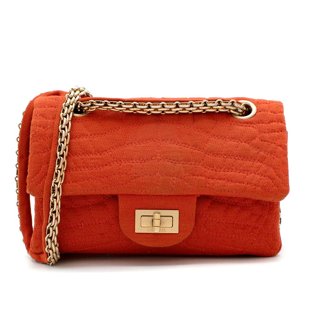 Chanel Burnt Orange Croc Embroidered Jersey Reissue 2.55 224 Bag

- Croc stitched design
- Shiny gold hardware on the clasp and chain strap 
- Soft wool fabric
- Small shape perfect for dressing up outfits
- Can adjust chain straps for a cross body