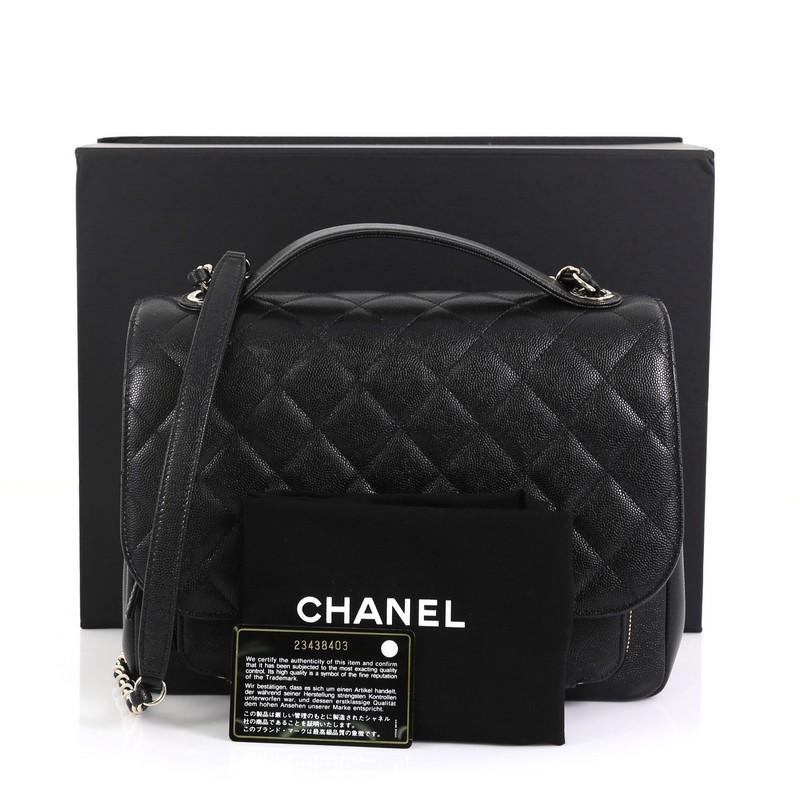 This Chanel Business Affinity Flap Bag Quilted Caviar Large, crafted in black quilted caviar leather, features single loop leather handle, woven in leather chain link strap, zip pocket under its flap and gold-tone hardware. Its CC turn-lock closure