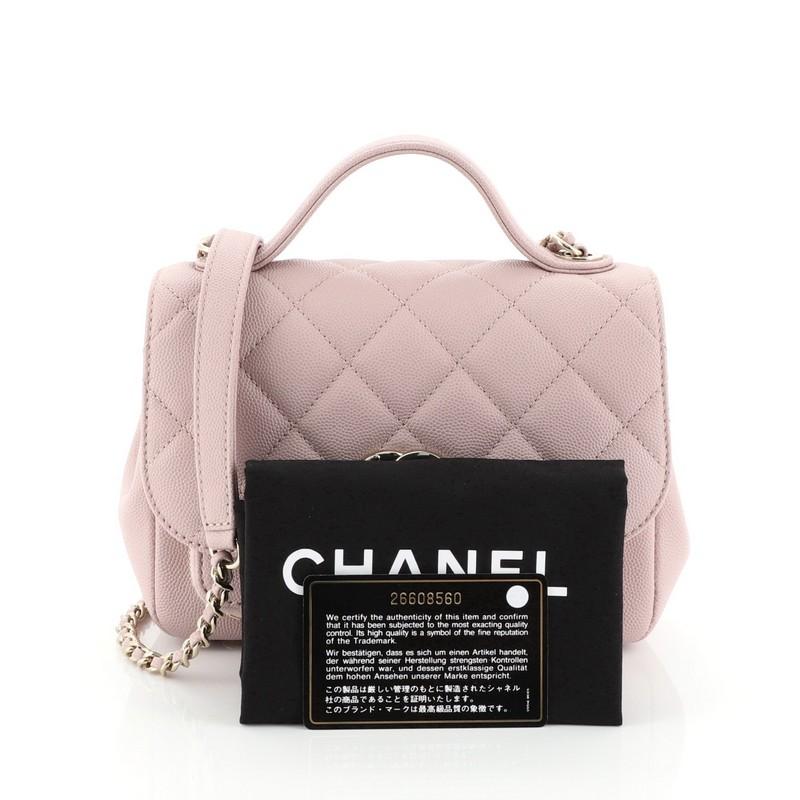 This Chanel Business Affinity Flap Bag Quilted Caviar Mini, crafted in pink quilted caviar, features single loop leather handle, woven in leather chain link strap with leather pad, zip pocket under its flap, and gold-tone hardware. Its CC turn-lock