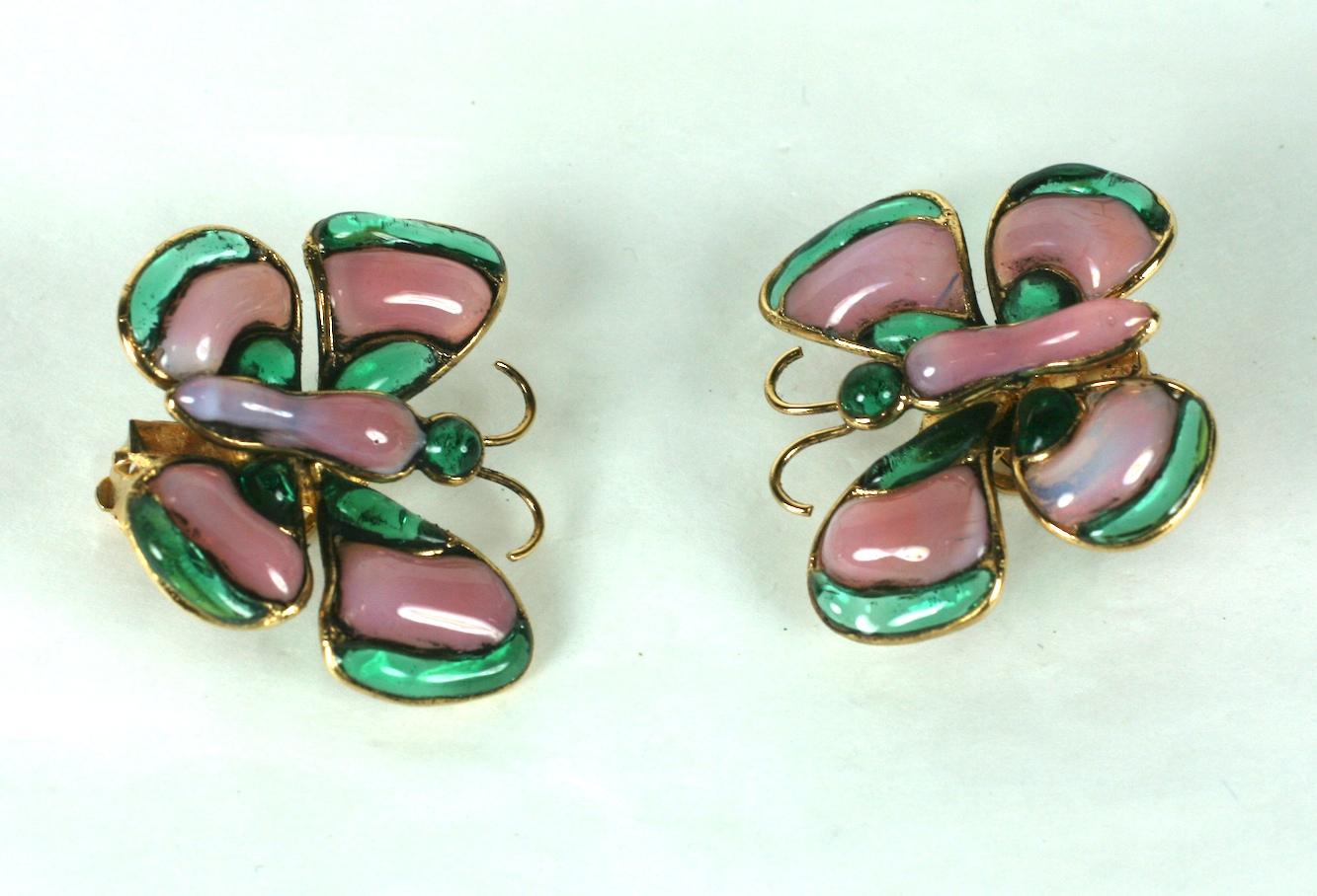 Chanel Maison Gripoix signature poured glass enamel butterfly ear clips of emerald and pale pink rose glass in hand made settings of gilt bronze metal. Clip back fittings. 
Excellent Condition, Signed.
Height 1.25