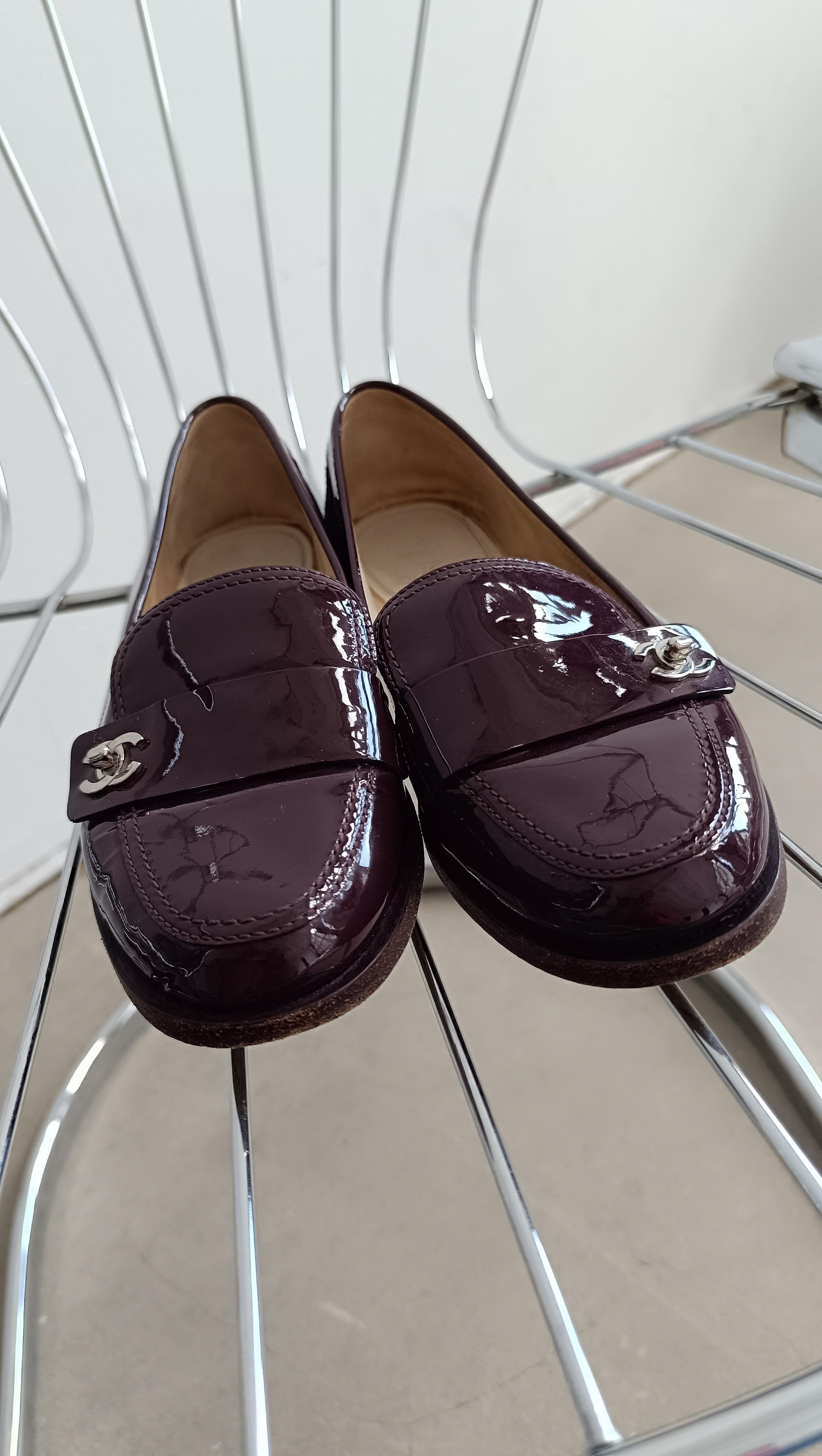 CHANEL by Karl Lagerfeld 15P / 2015 Chanel TurnLock Enamel Loafers
Chanel by Karl Lagerfeld
Collection: spring / summer 2015 
Style: 15P / R G30708
Country of production: Italy

Chanel CC Turlock burgundy leather loafers with rounded toe, leather