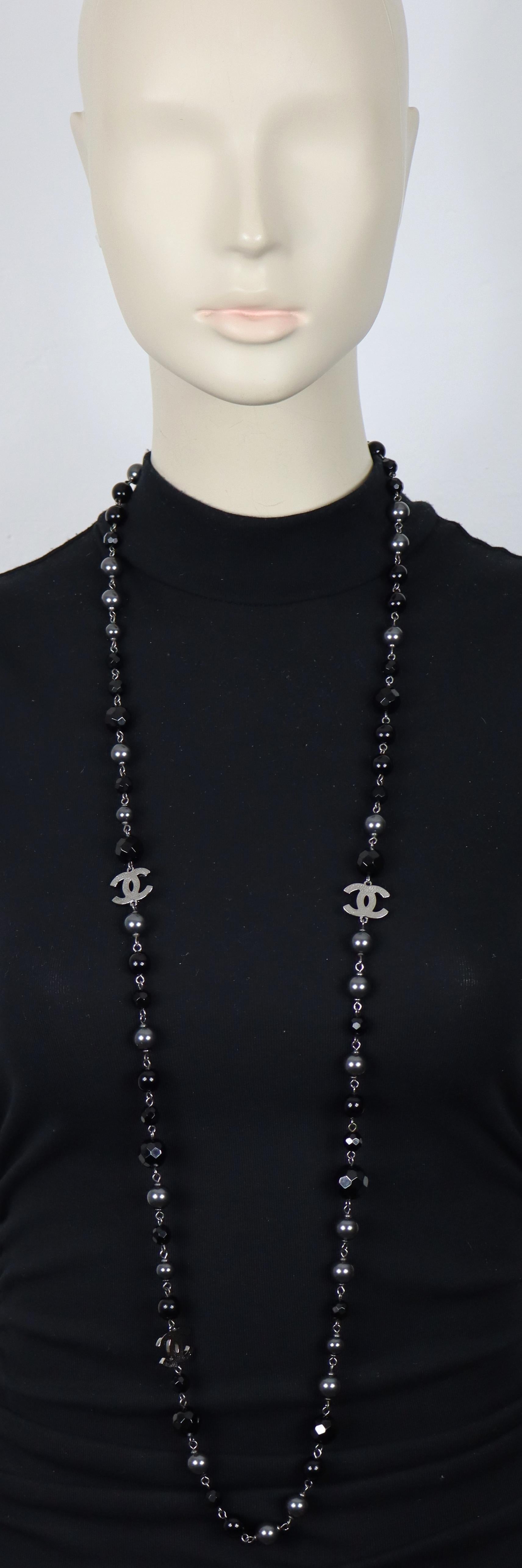CHANEL by KARL LAGERFELD necklace featuring a strand of black beads and grey faux pearls with three quilted silver tone CC logos.

Lobster clasp closure.

Embossed CHANEL A11 V Made in France.

Indicative measurements : total length approx. 112 cm