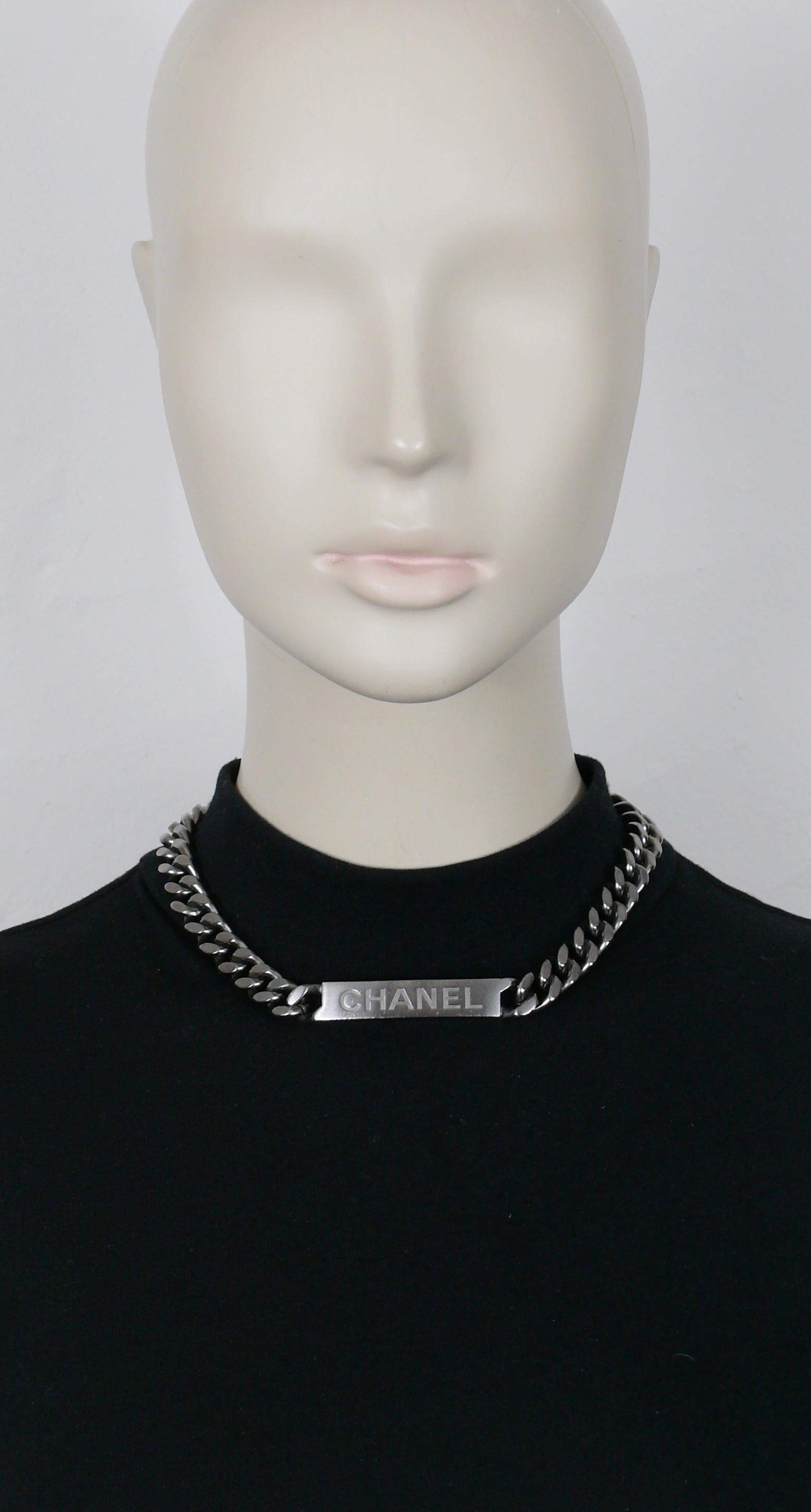 CHANEL by KARL LAGERFELD ruthenium tone curb link chain necklace featuring an ID tag embossed CHANEL.

Lobster clasp closure.

Laser mark CHANEL B15 P Made in Italy.

Indicative measurements : length approx. 42.5 cm (16.73 inches) / chain width