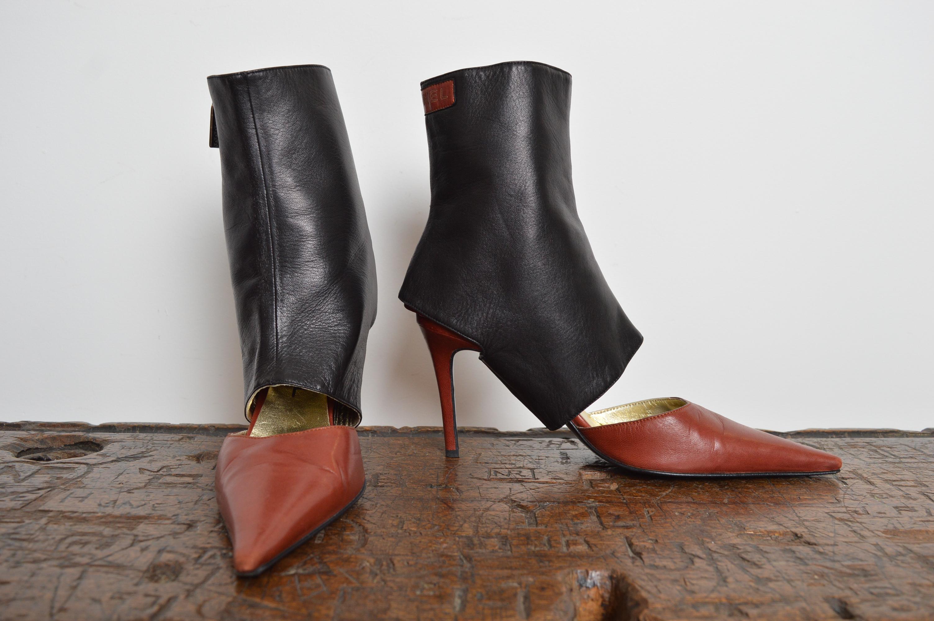 CHANEL by Karl Lagerfeld extremely rare Black & Red Motorcycle Heels with Detachable zip down Ankle Sleeves, Pointed Toes and elasticated sling back straps.
Size; UK 4 / EU 36
Heel Height; 3” inches
Condition; 8/10 Fantastic Condition, extremely