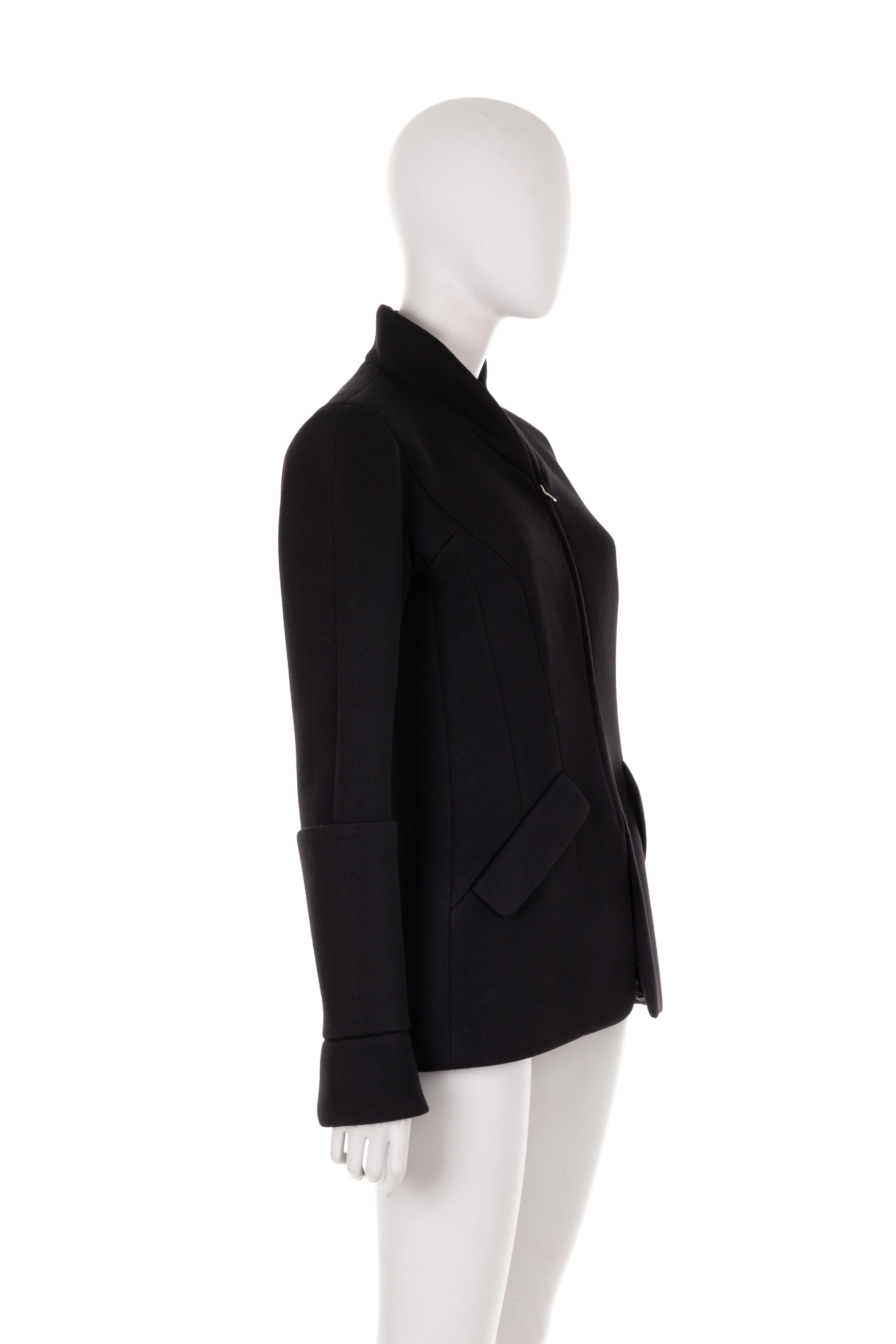 - Chanel by Karl Lagerfeld
- Sold by Gold Palms Vintage
- Fall Winter 2009 collection
- Black wool/nylon blend long sleeve jacket
- High collar
- Deep rolled up cuffs
- Front hip welted pockets
- Front and back zipper closure
- Size: 40

Shoulder to