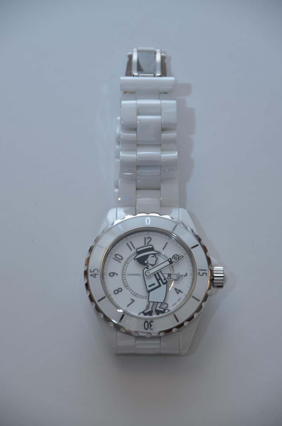 100% authentic guaranteed 
Chanel J12 watch Chanel’s famous ceramic J12 watch with a delightful representation of Mademoiselle Coco Chanel on the dial 
Functions: hours, minutes Case: 38mm white high-tech ceramic and steel, caseback set with one