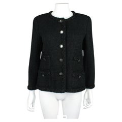 Petite veste noire Chanel par Karl Lagerfeld, Cruise 2011