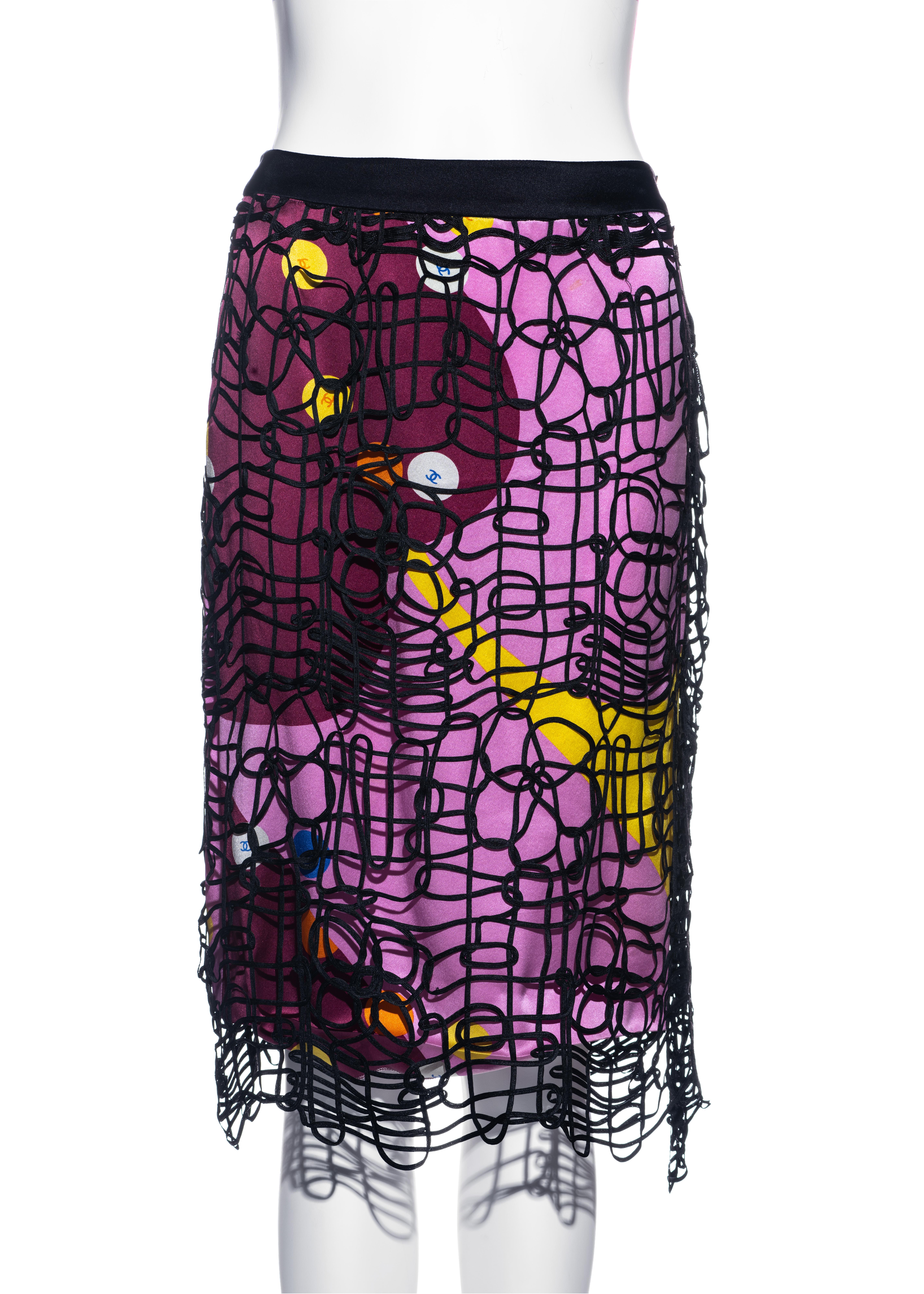 ▪ Chanel multicoloured floral silk skirt
▪ Designed by Karl Lagerfeld
▪ Black ribbon overlay 
▪ 'CC' engraved buttons 
▪ FR 36 - UK 8 - US 4
▪ Spring-Summer 2000